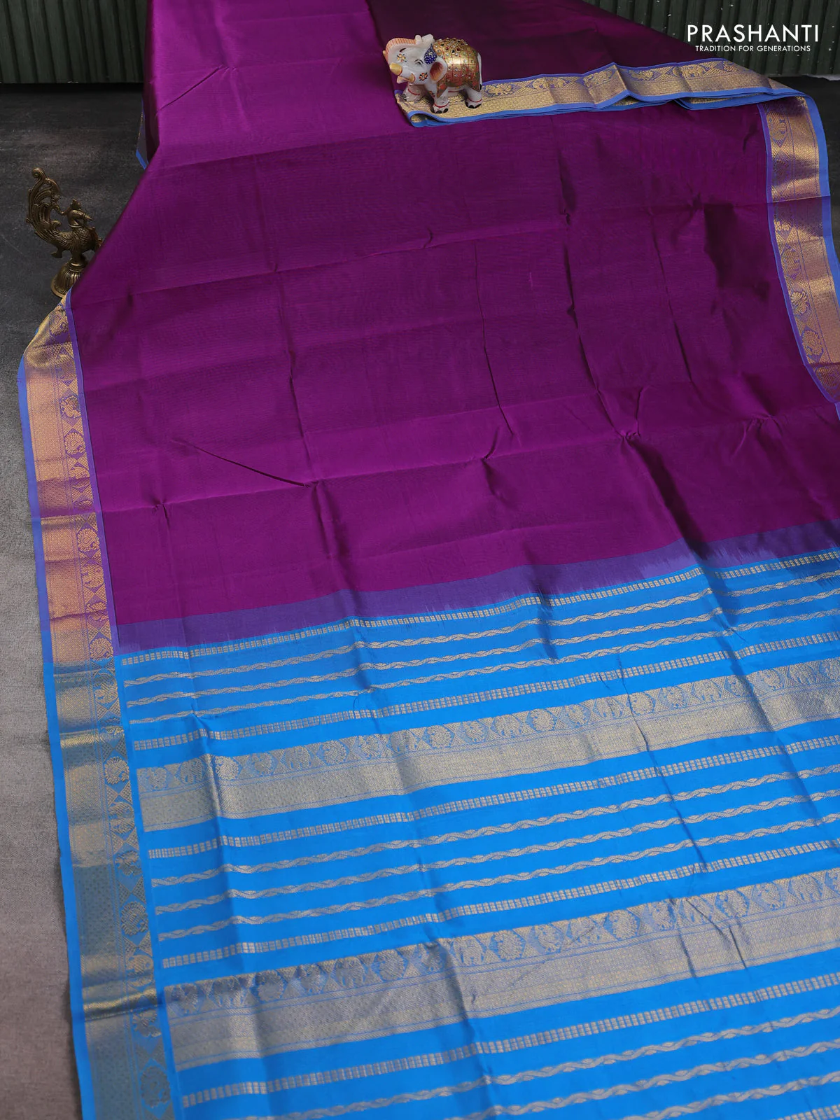 Silk cotton saree purple and cs blue with plain body and zari woven border - Image 2