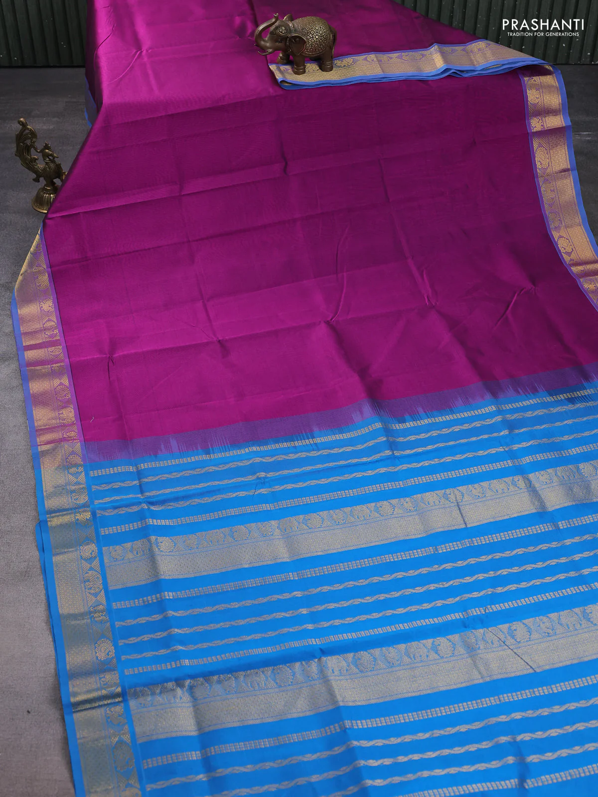 Silk cotton saree purple and cs blue with plain body and zari woven border - Image 2