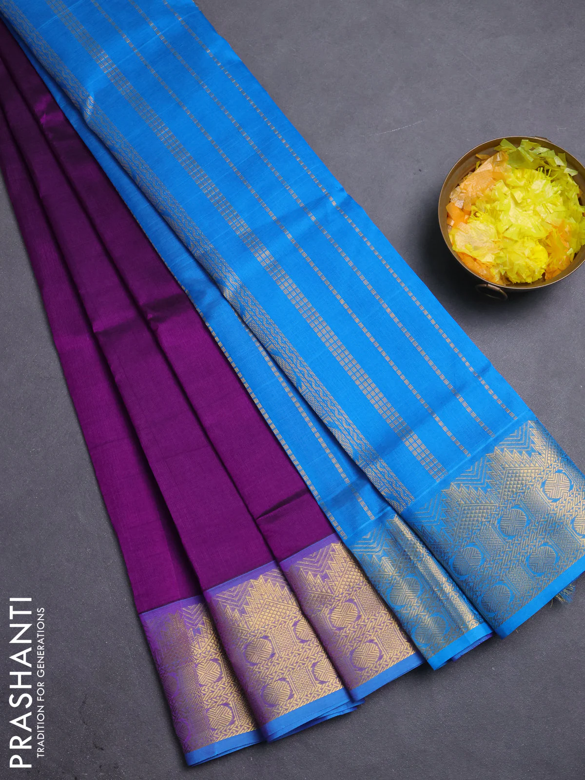 Silk cotton saree purple and cs blue with plain body and zari woven border
