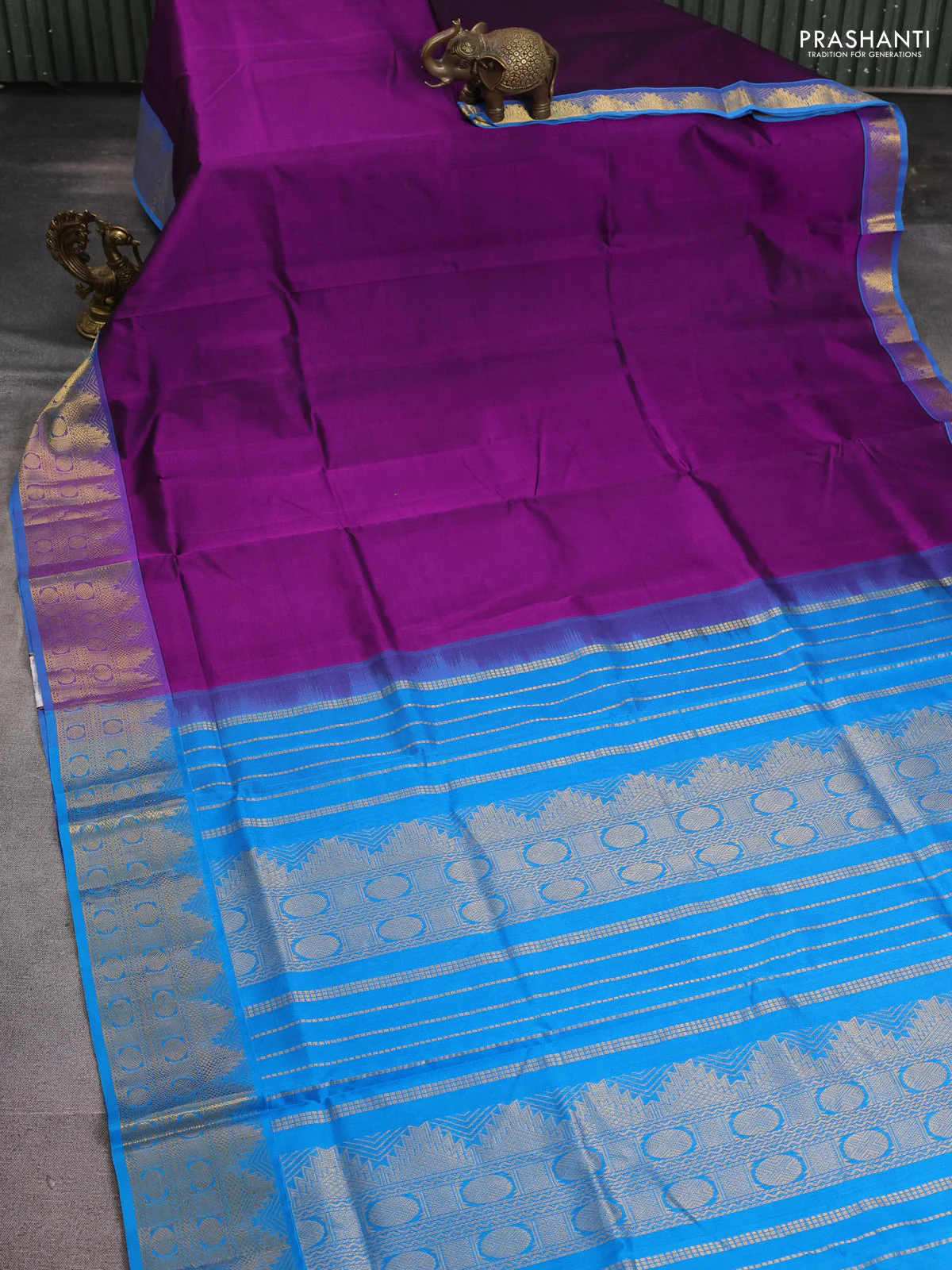 Silk cotton saree purple and cs blue with plain body and zari woven border - Image 2