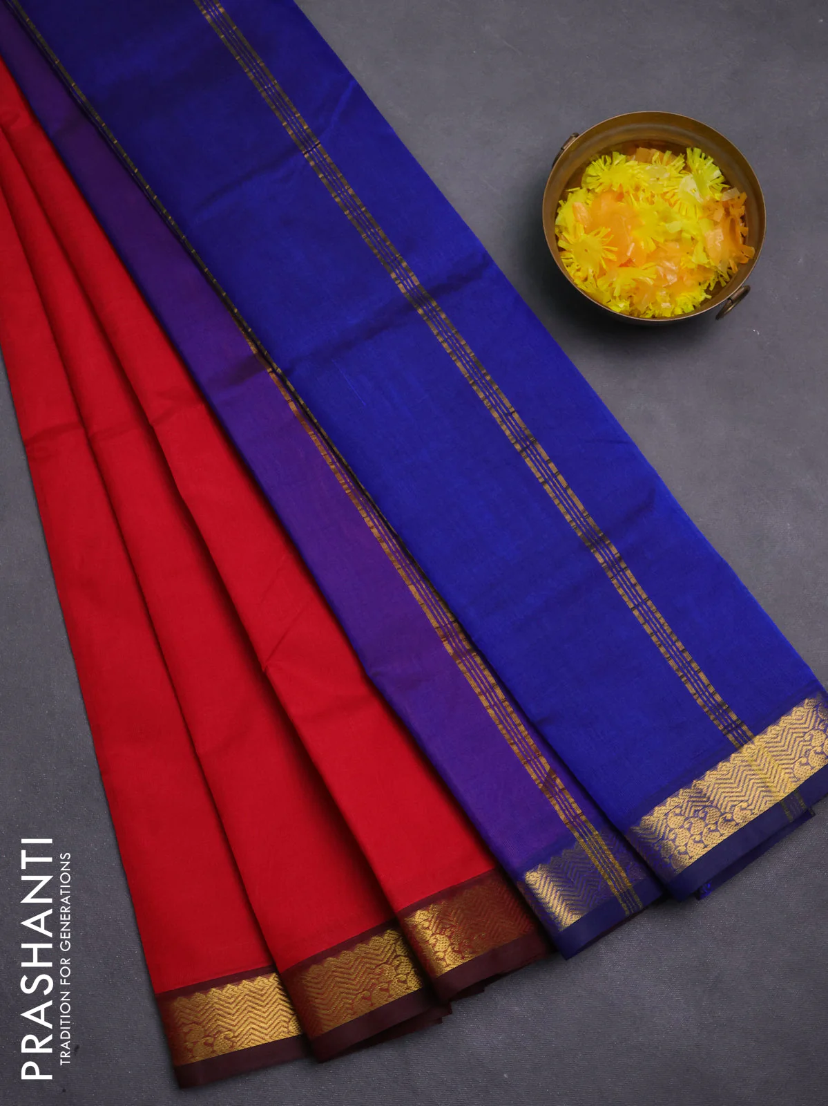 Silk cotton saree red and blue with plain body and paisley zari woven border