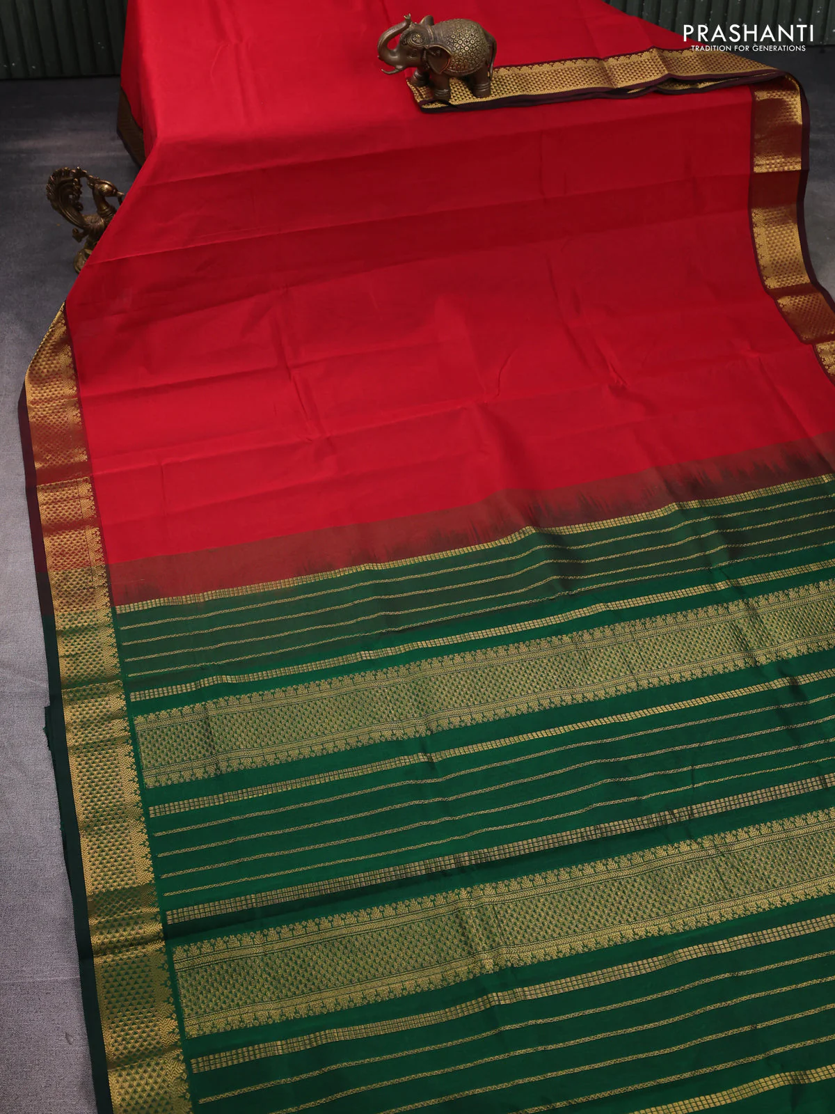Silk cotton saree red and green with plain body and zari woven border - Image 2