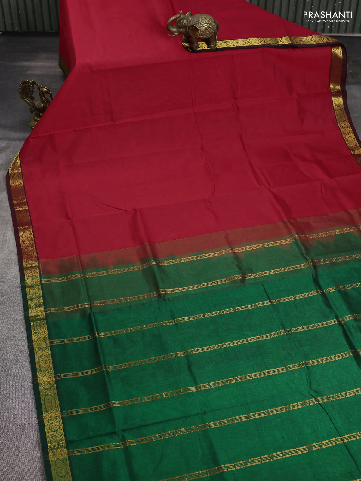 Silk cotton saree red and green with plain body and zari woven border - Image 2
