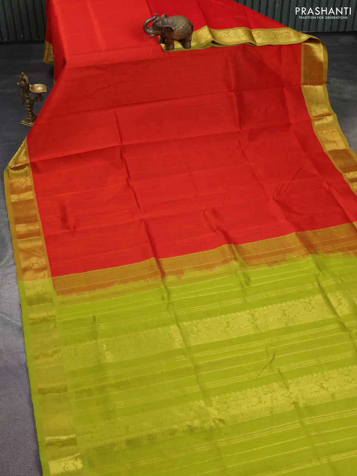 Silk cotton saree red and light green with plain body and zari woven border - Image 2