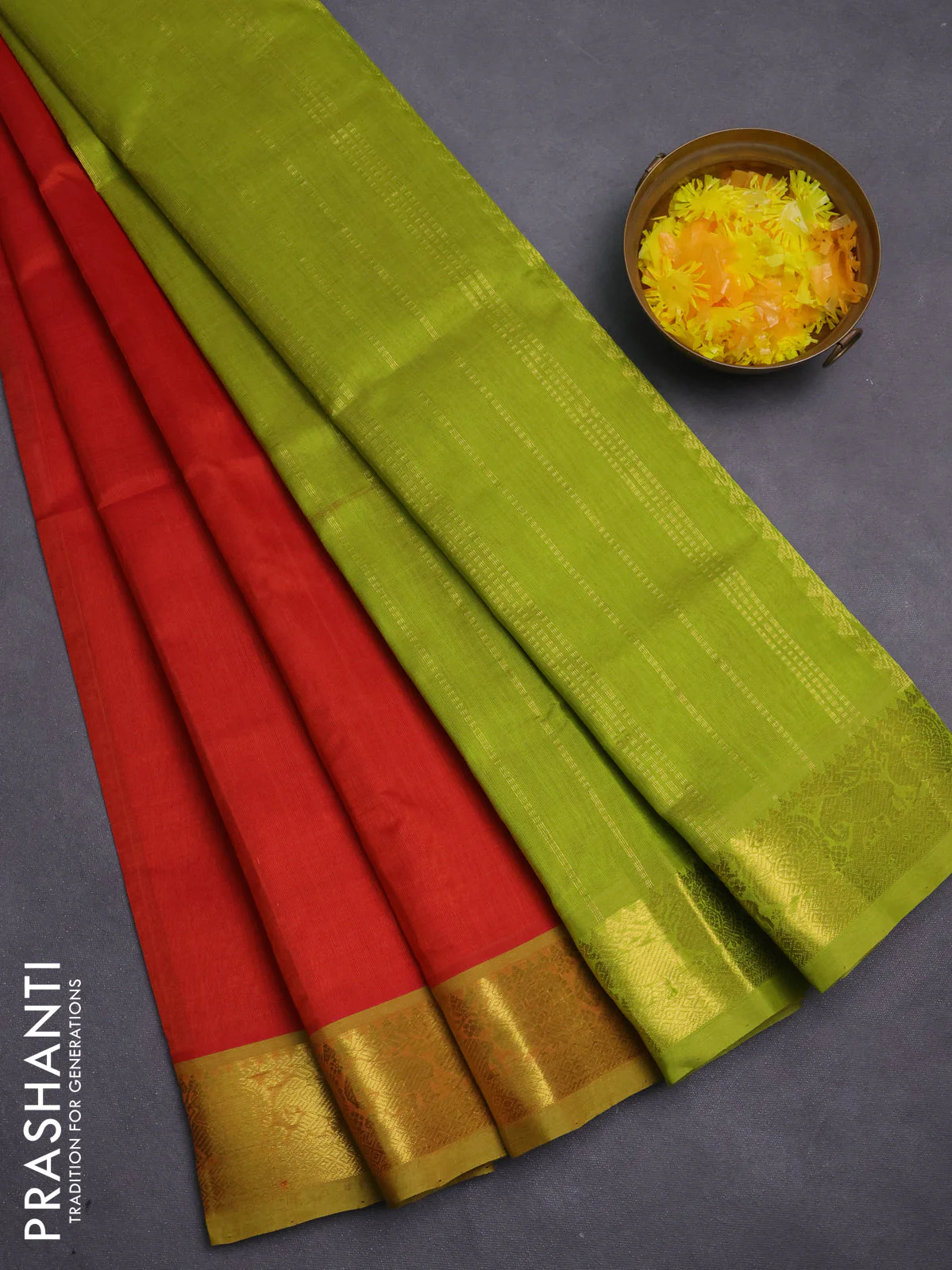 Silk cotton saree red and light green with plain body and zari woven border