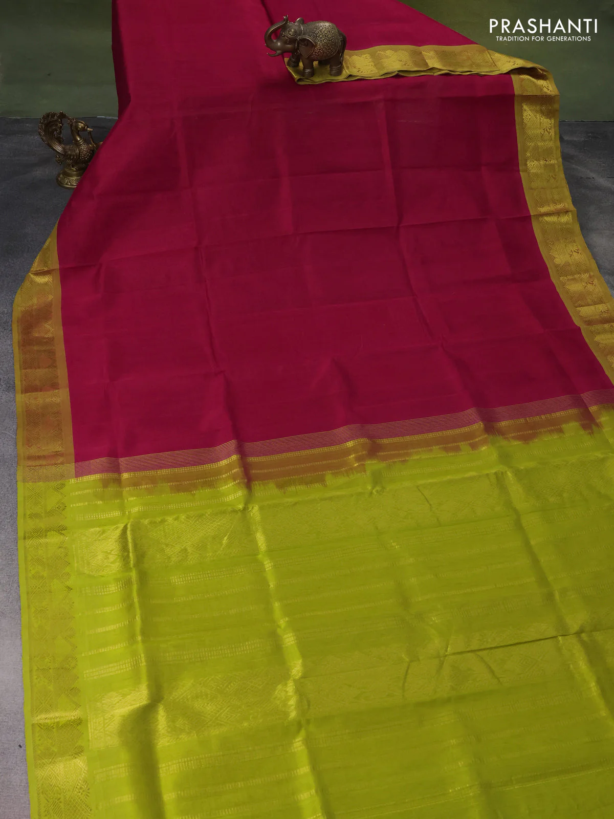 Silk cotton saree red and light green with plain body and zari woven border - Image 2