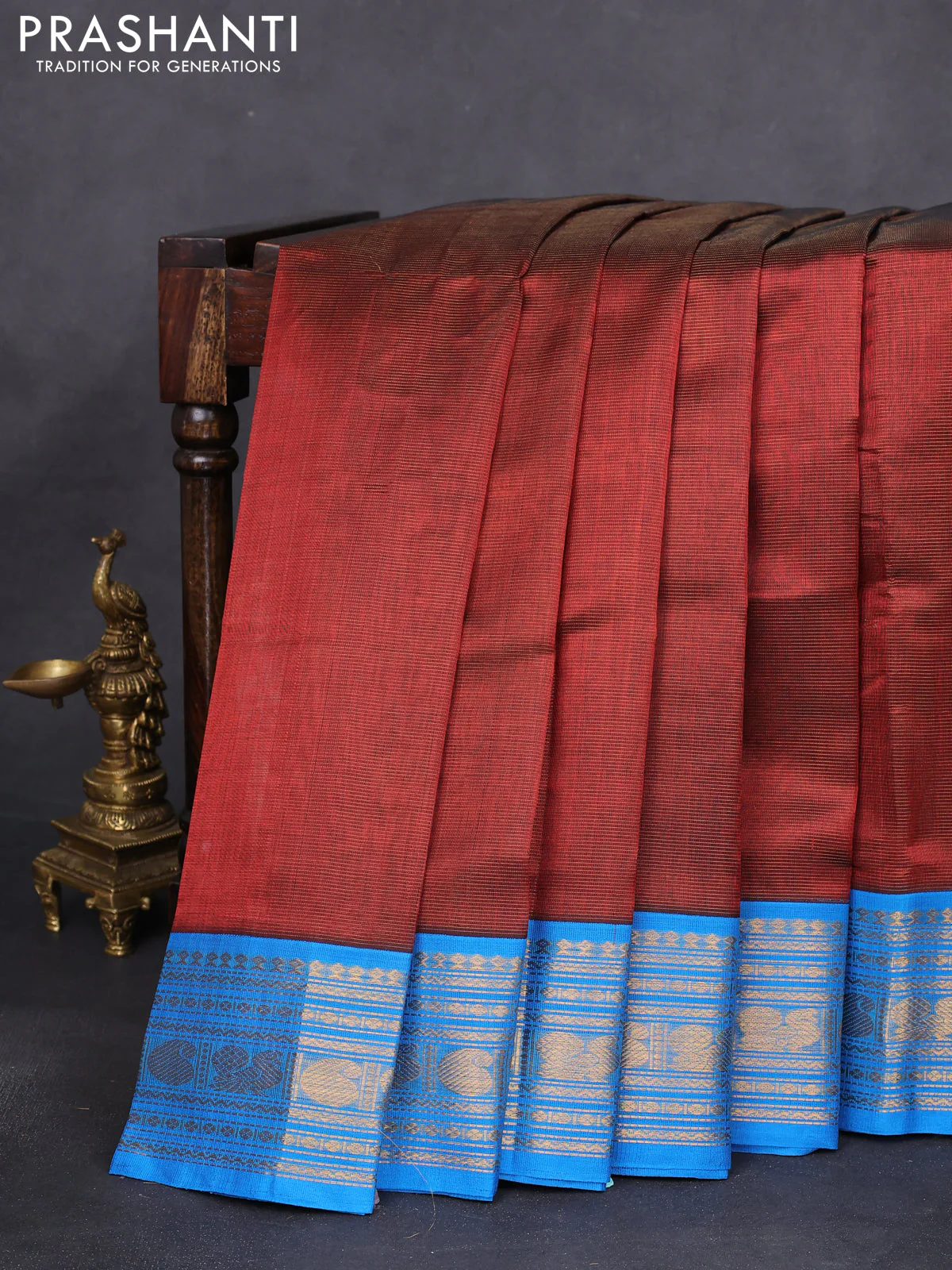 Silk cotton saree rust shade and cs blue with allover vairaosi pattern and zari woven korvai border
