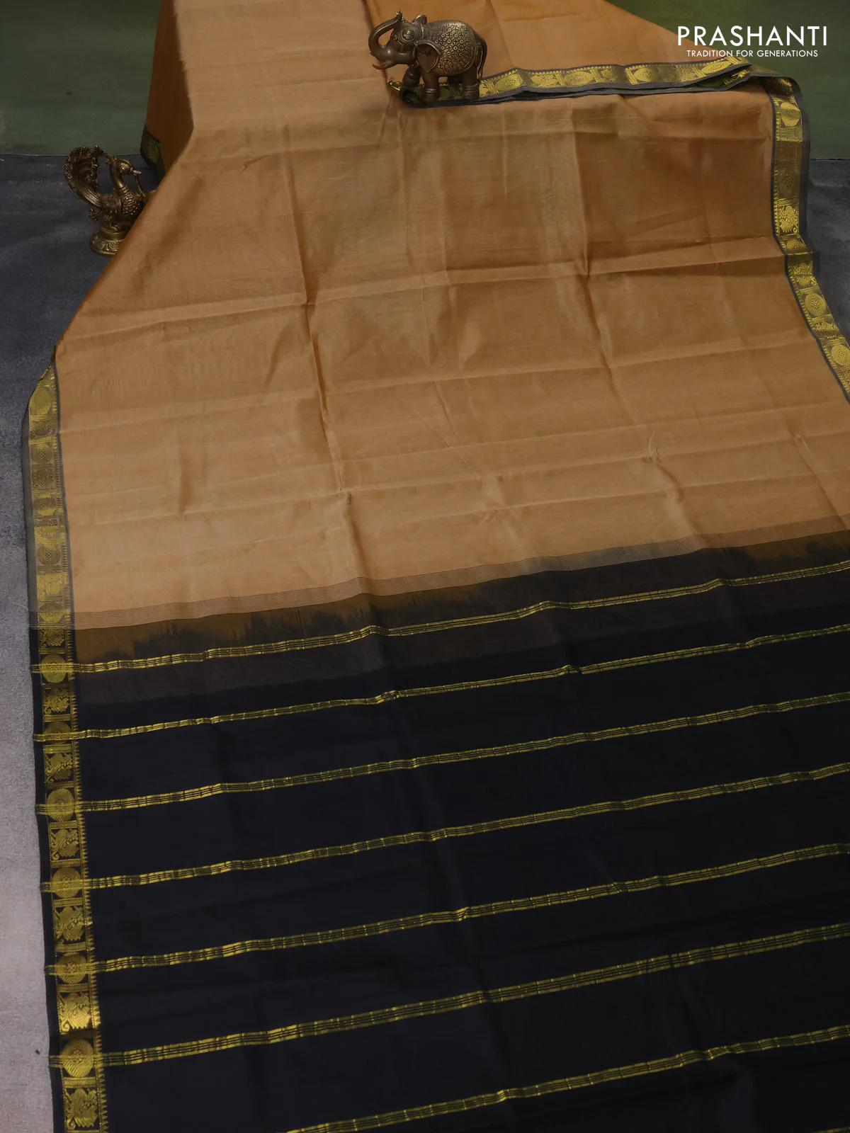 Silk cotton saree sandal and black with plain body and zari woven border - Image 2