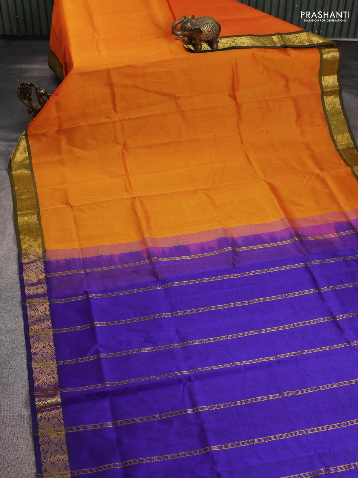 Silk cotton saree sunset orange and blue with plain body and peacock zari woven border - Image 2