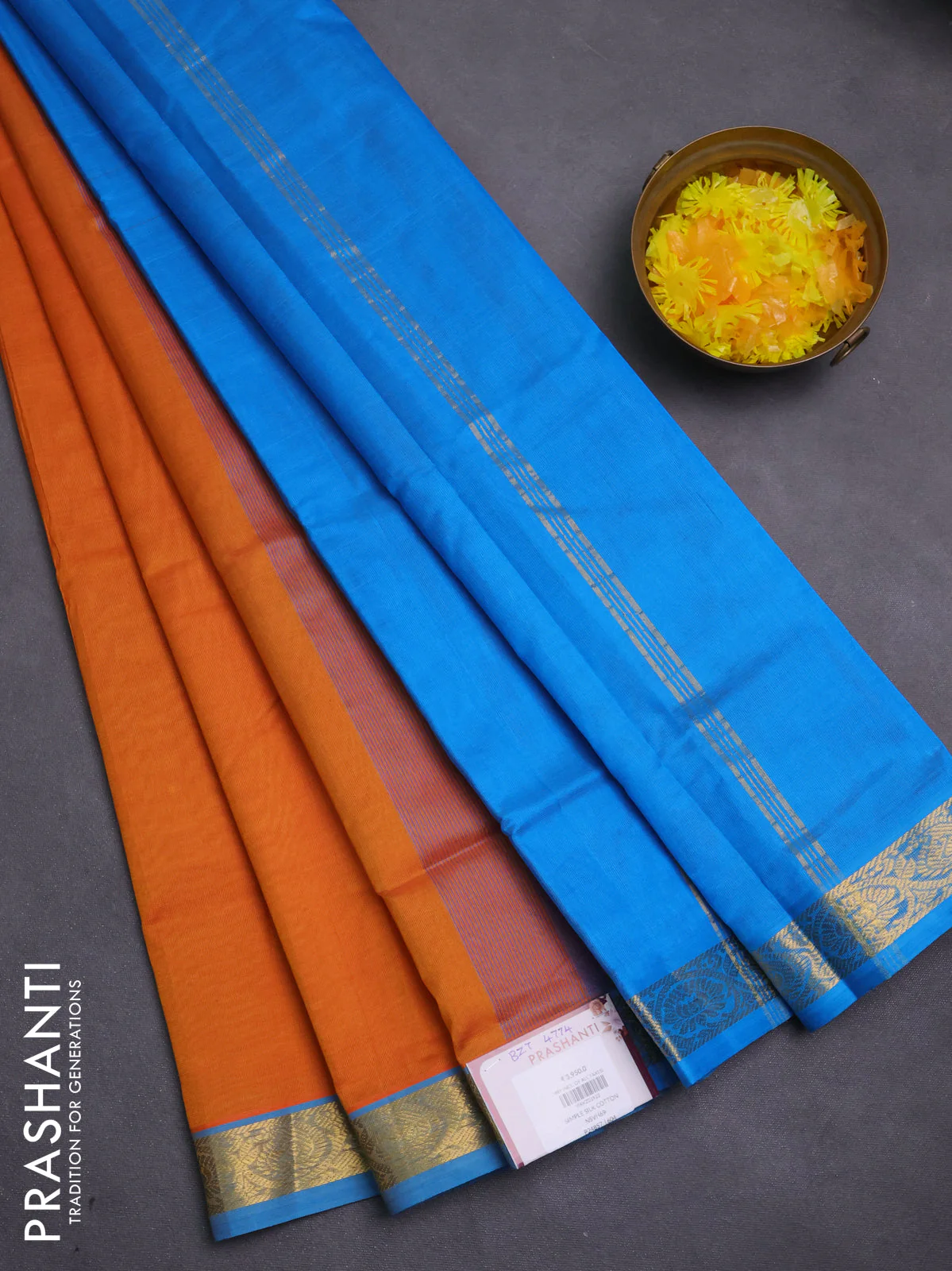 Silk cotton saree sunset orange and cs blue with plain body and zari woven border