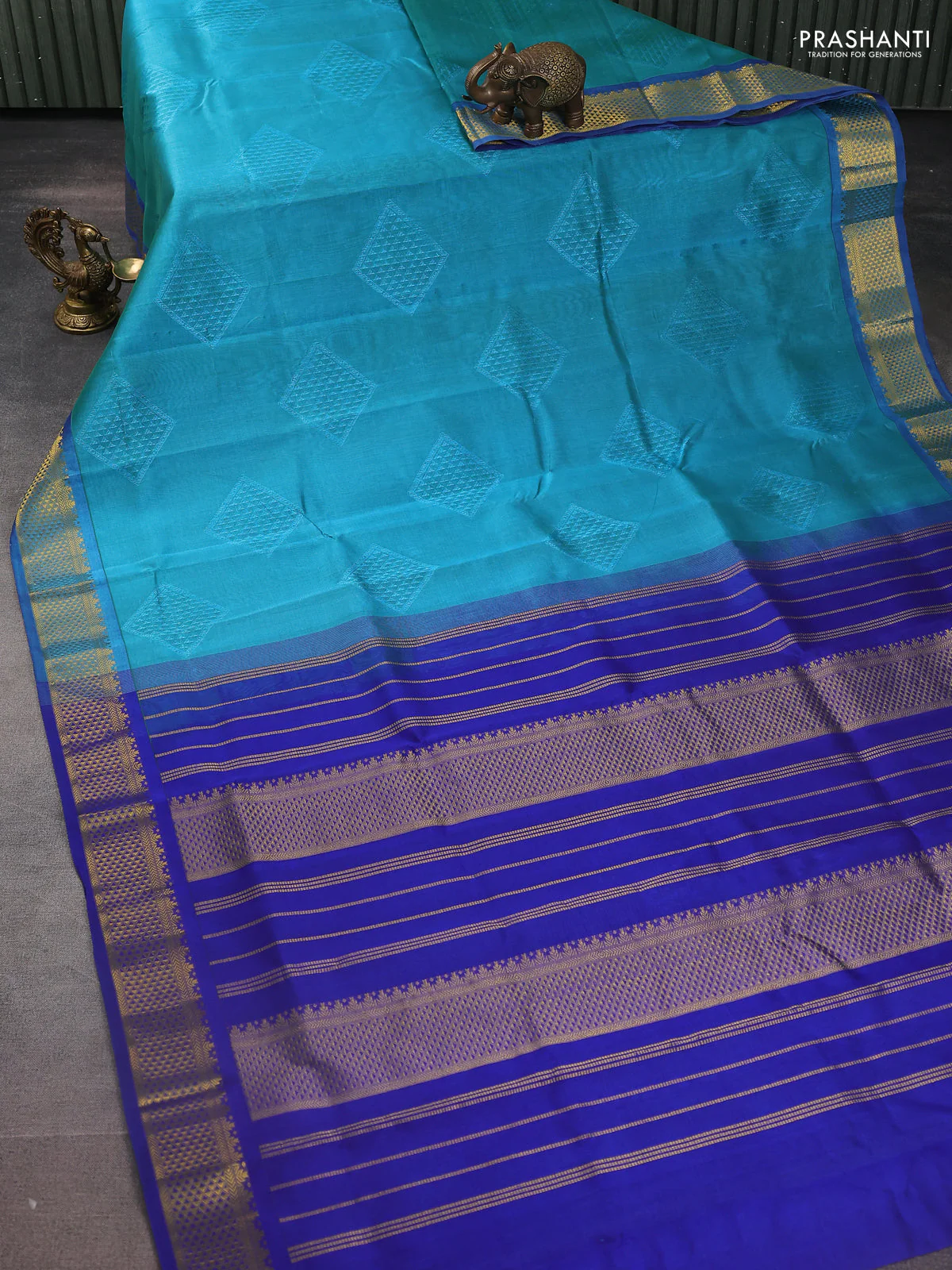 Silk cotton saree teal blue and blue with allover self emboss jacquard and zari woven border - Image 2