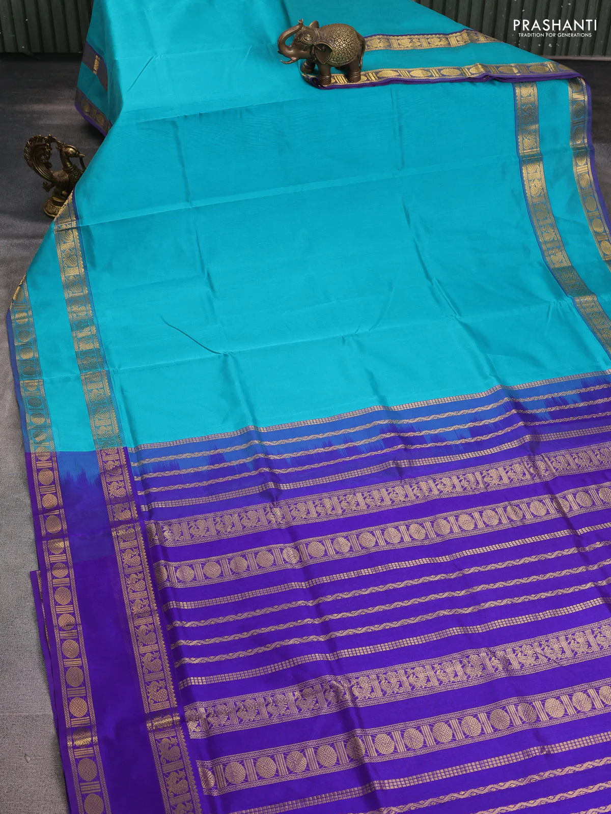 Silk cotton saree teal blue and blue with plain body and rettapet zari woven border - Image 2