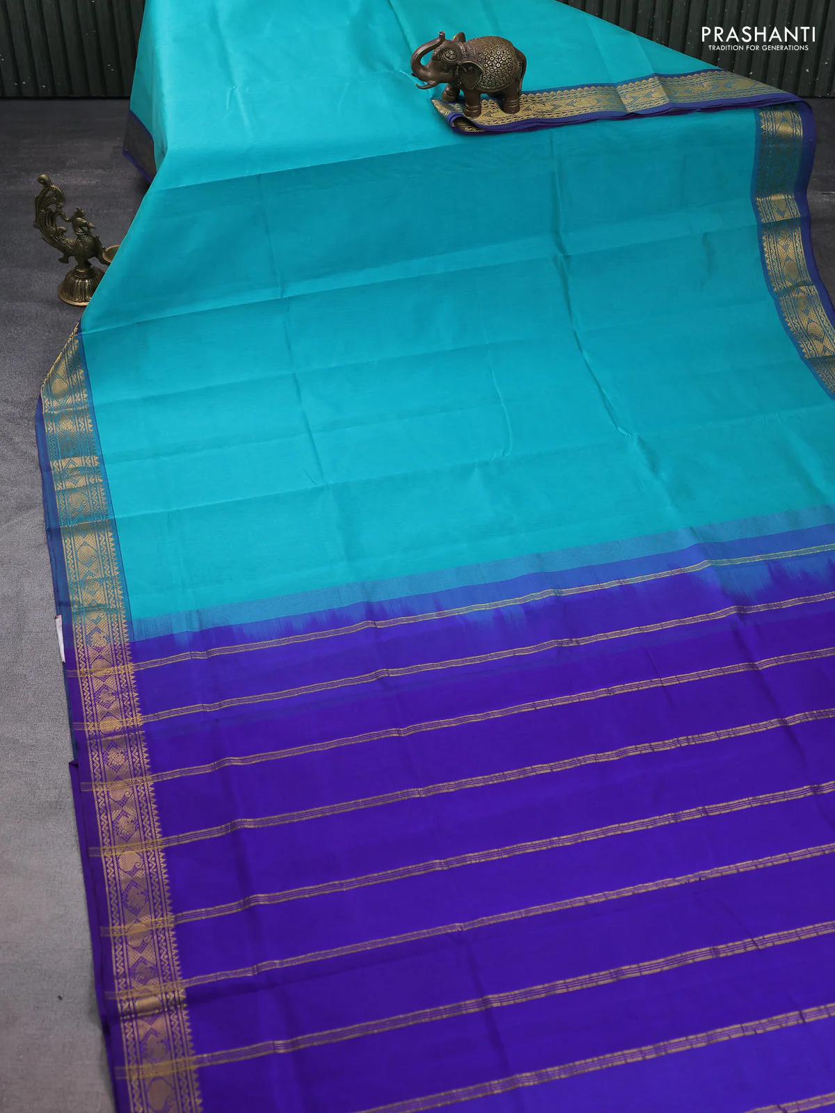 Silk cotton saree teal blue and blue with plain body and zari woven border - Image 2