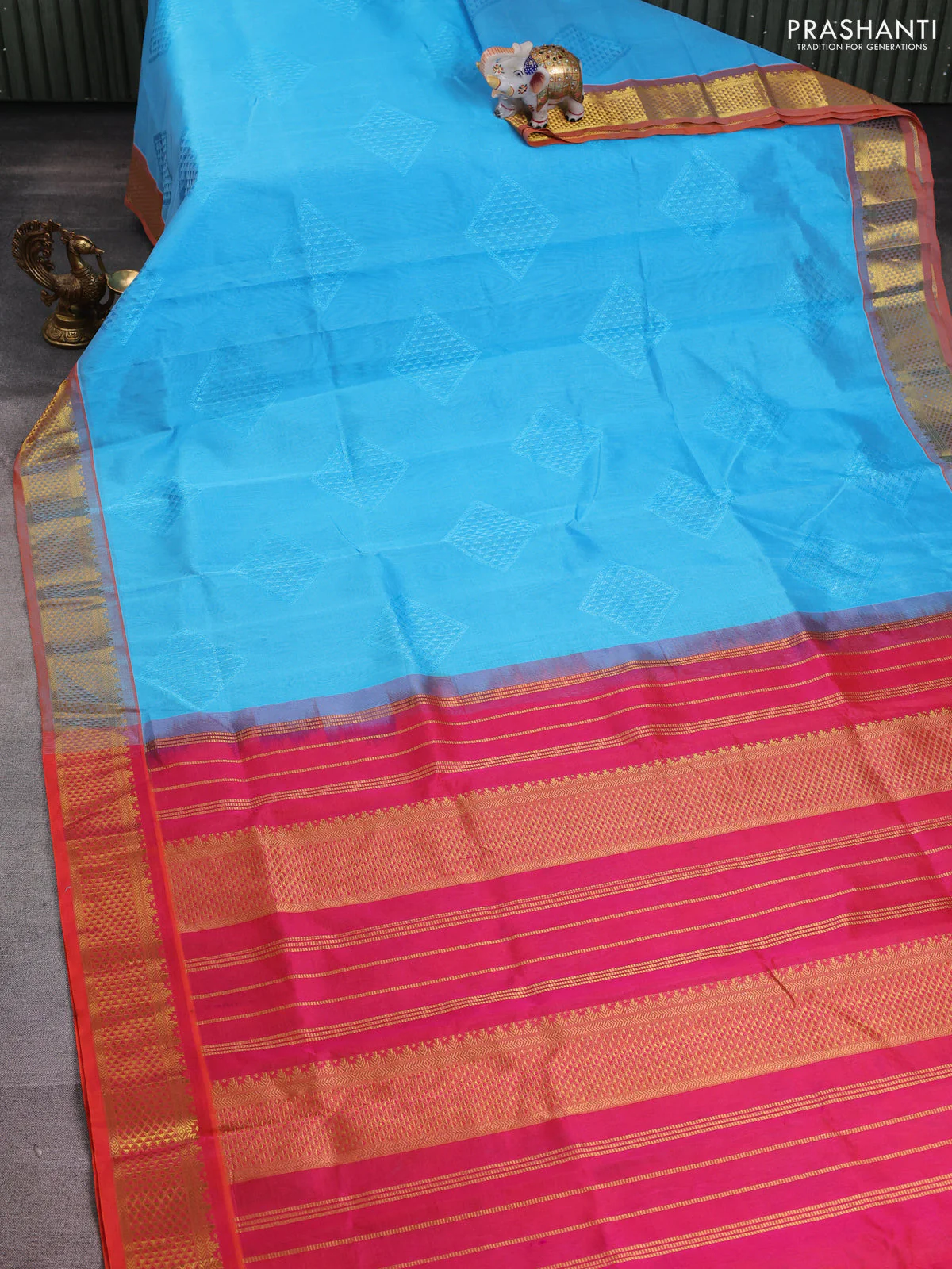 Silk cotton saree teal blue and dual shade of pinkish orange with allover self emboss jacquard and zari woven border - Image 2