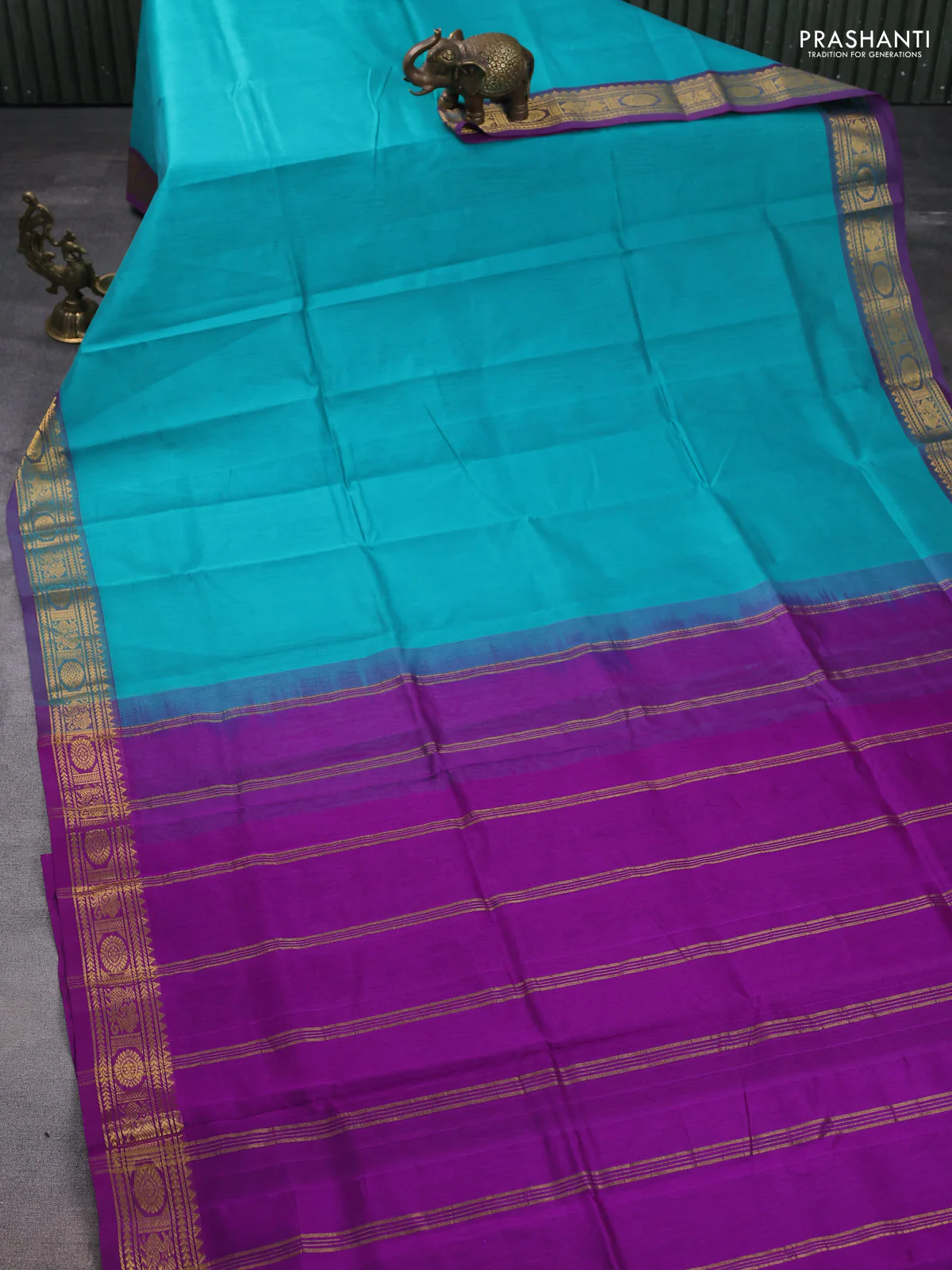Silk cotton saree teal blue and purple with plain body and peacock zari woven border - Image 2