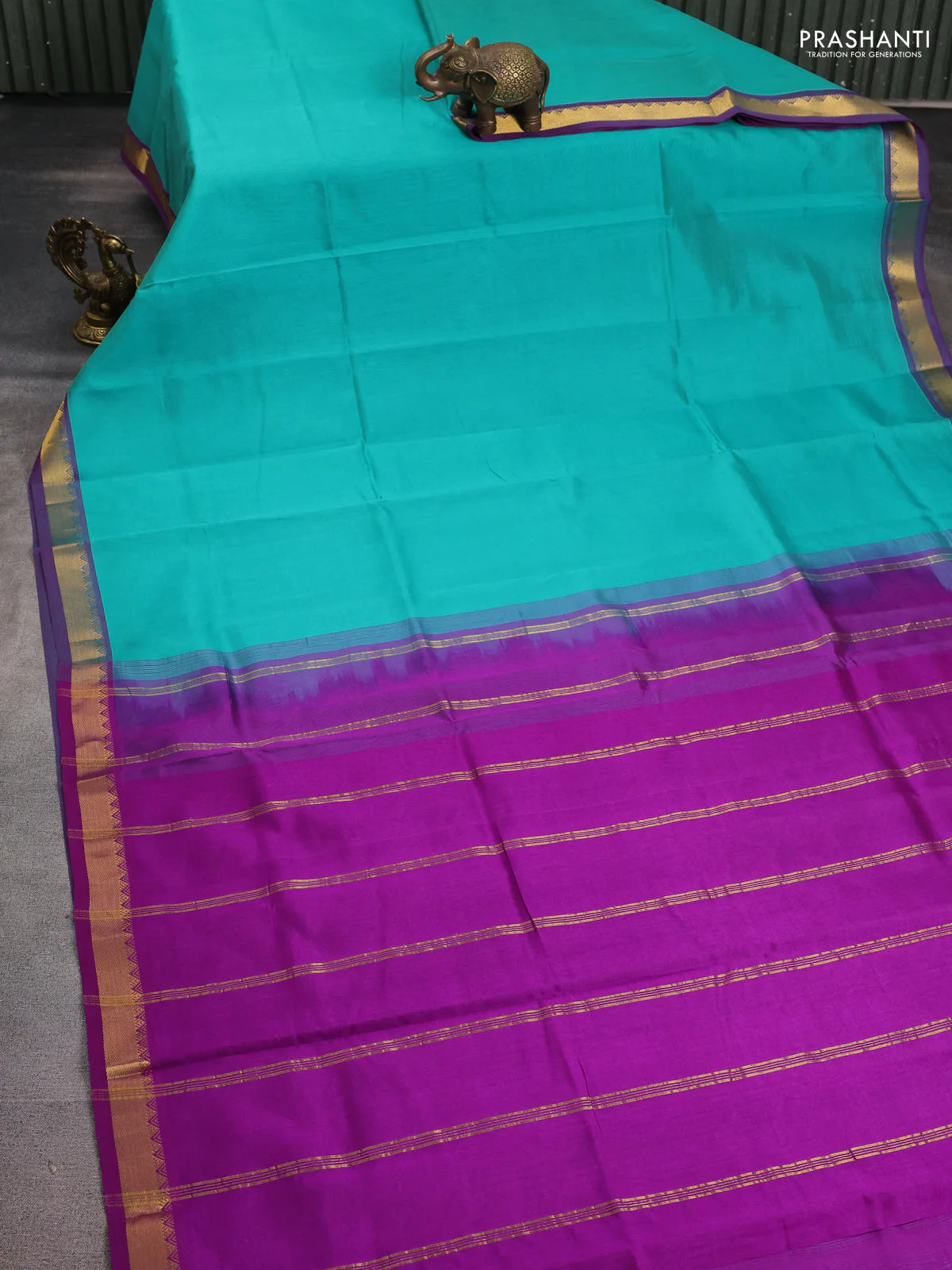 Silk cotton saree teal blue and purple with plain body and zari woven border - Image 2