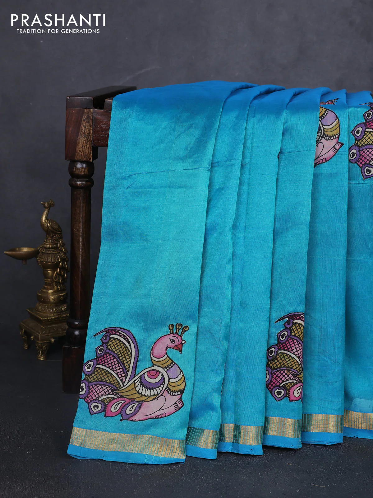 Silk cotton saree teal blue with kalamkari applique work and zari woven border