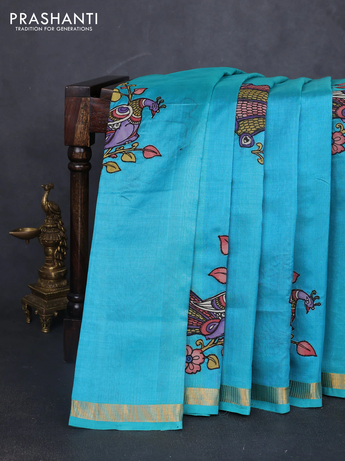 Silk cotton saree teal blue with kalamkari applique work and zari woven border
