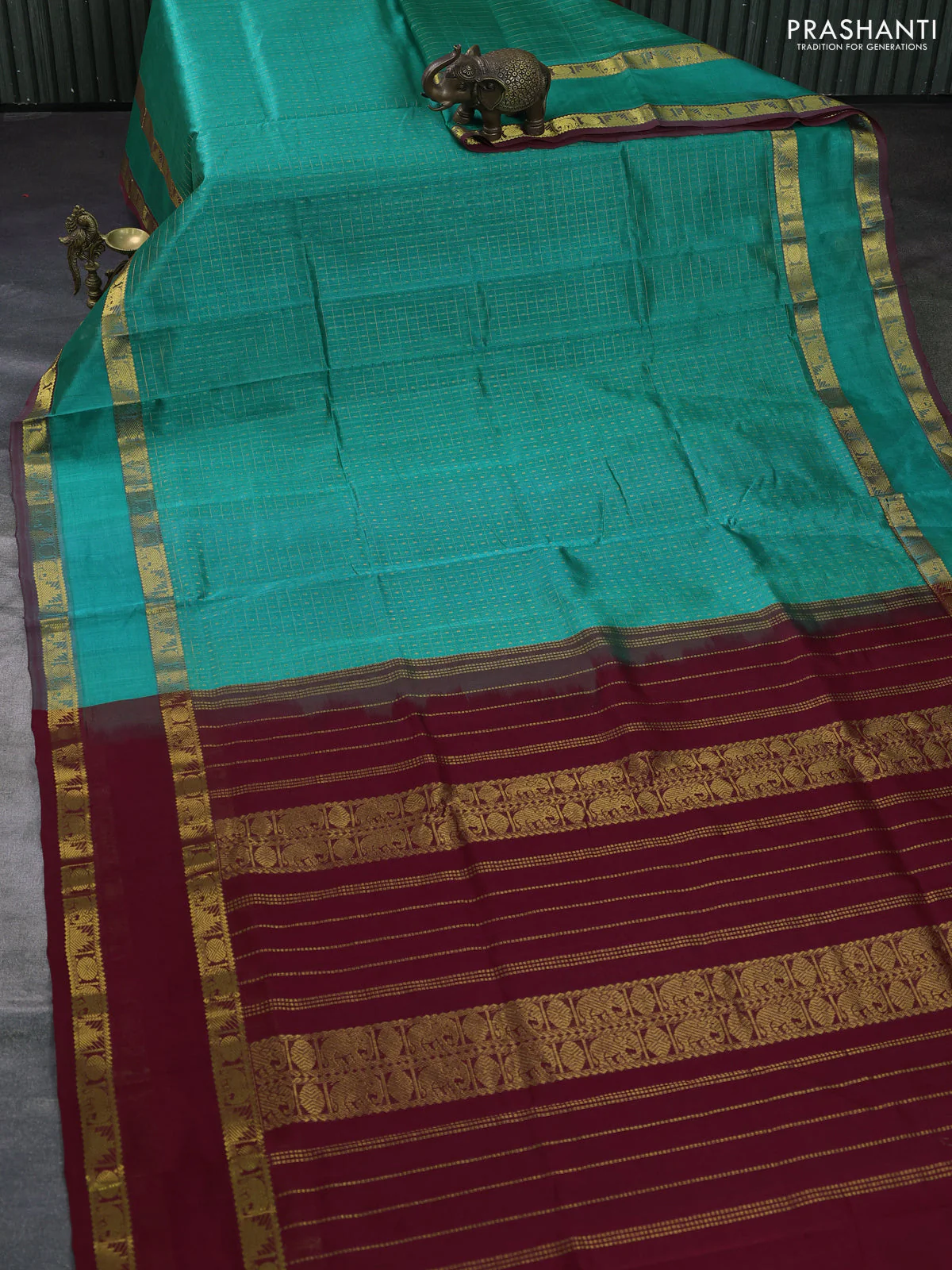 Silk cotton saree teal green and maroon with allover zari lakshadeepam patten and rettapet zari woven border - Image 2