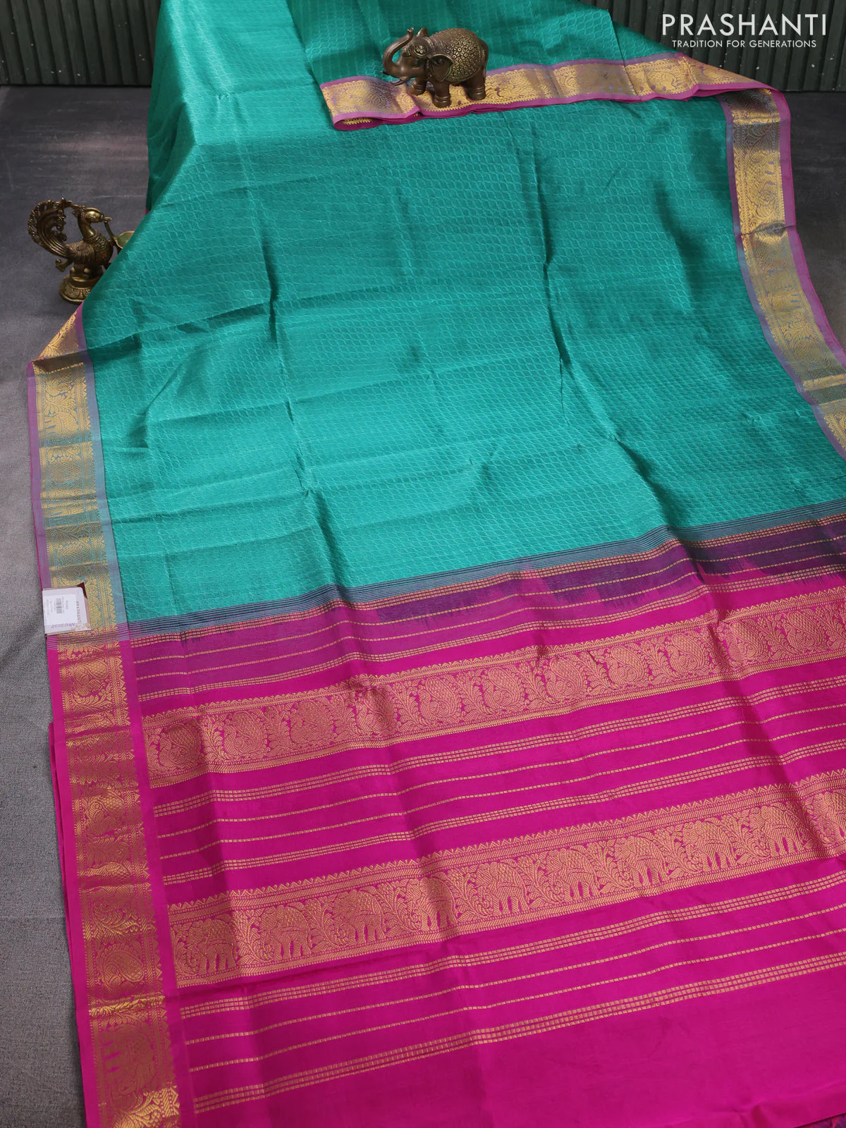 Silk cotton saree teal green and pink with allover self emboss jacquard and annam zari woven border - Image 2