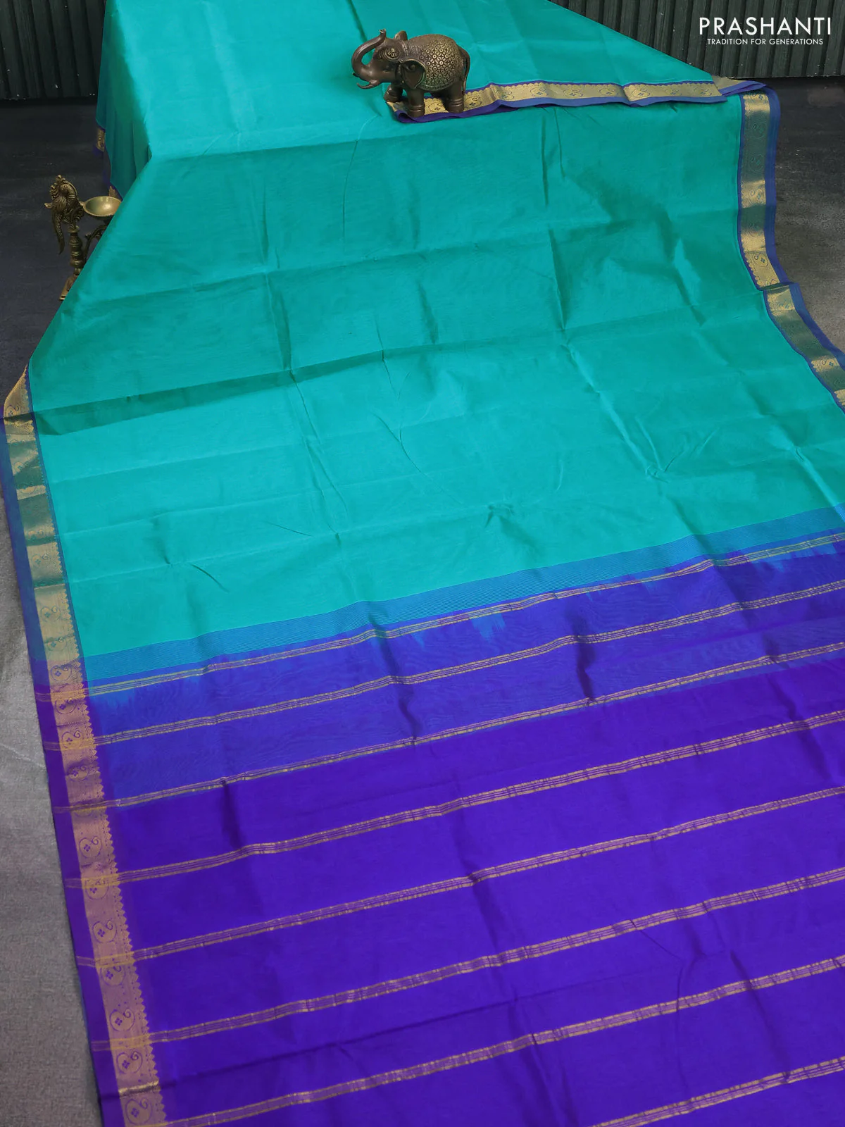 Silk cotton saree teal green and purple with plain body and zari woven border - Image 2