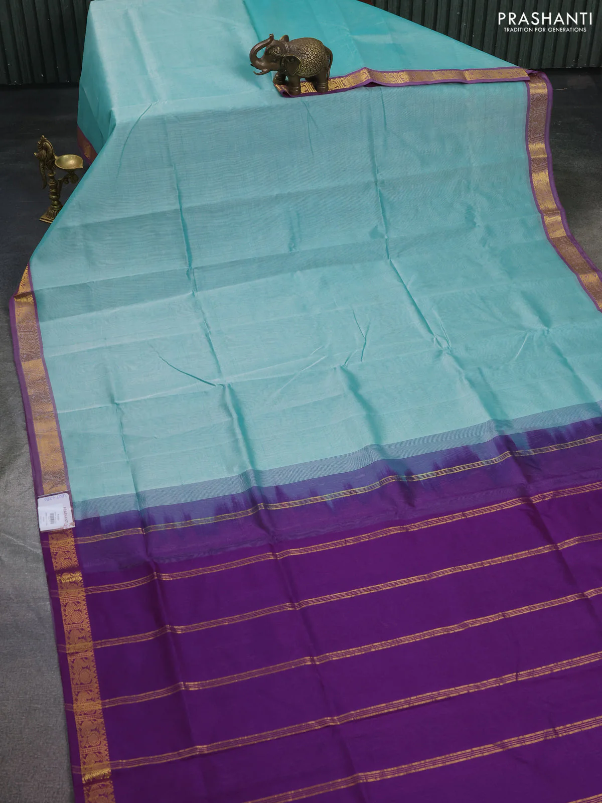 Silk cotton saree teal green and purple with plain body and zari woven border - Image 2