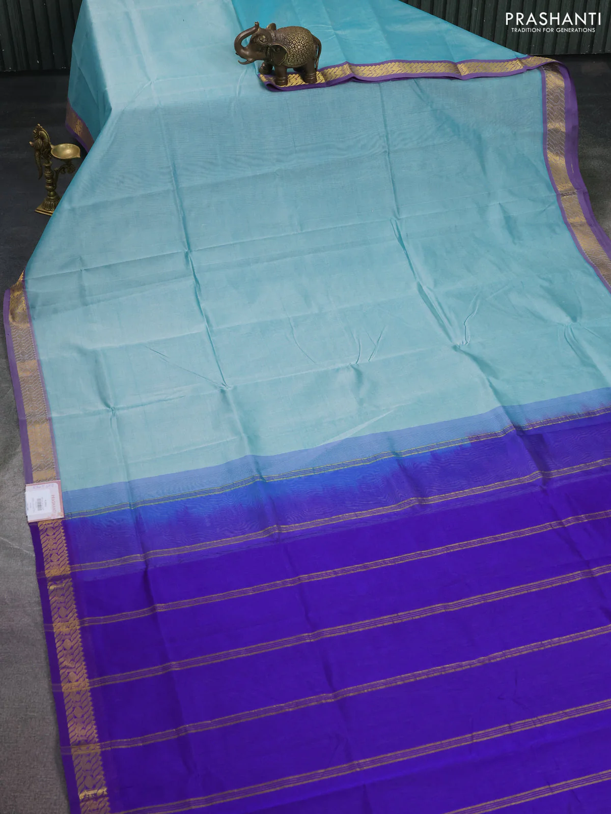 Silk cotton saree teal green and violet with plain body and zari woven border - Image 2
