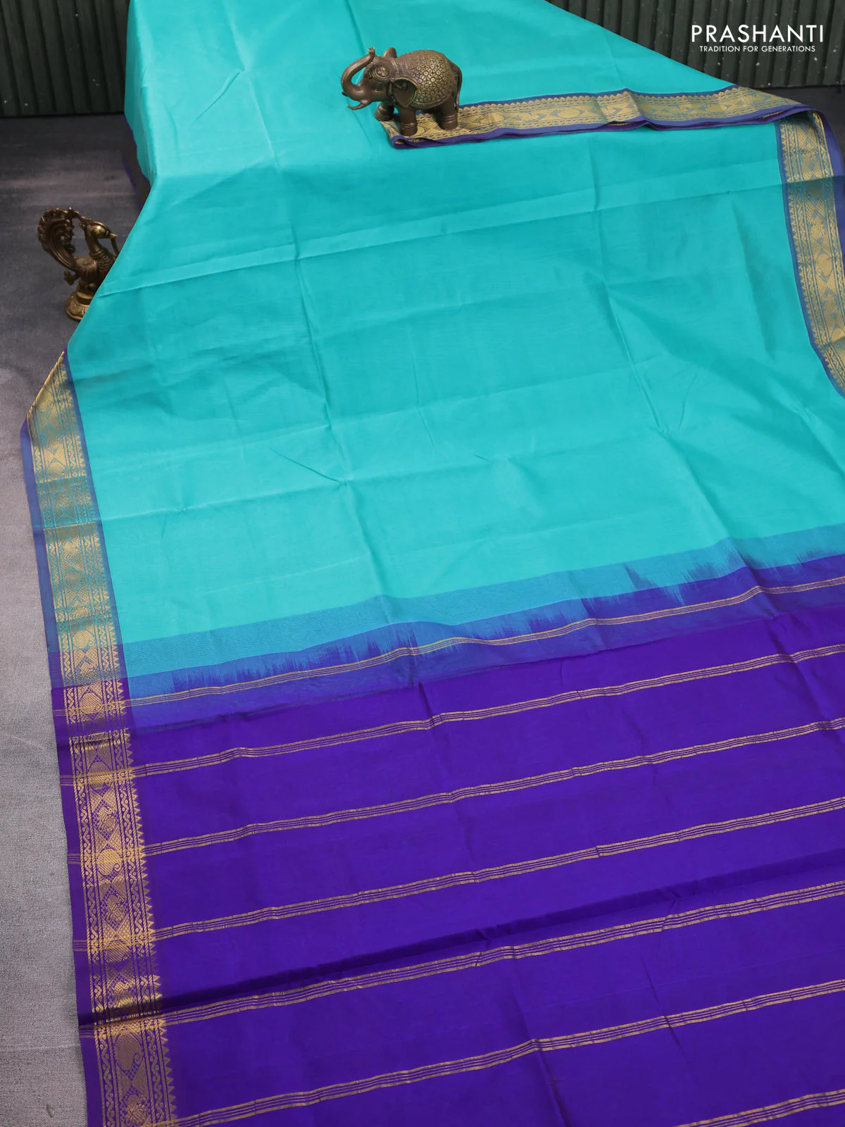 Silk cotton saree teal green shade and violet with plain body and zari woven border - Image 2