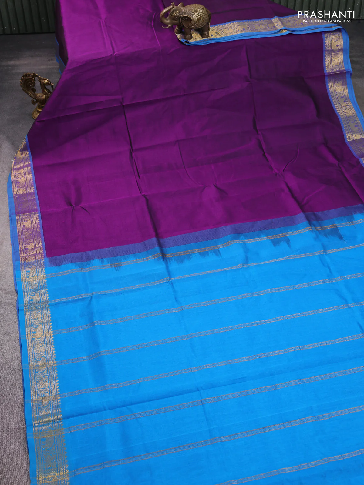 Silk cotton saree violet and cs blue with plain body and zari woven border - Image 2
