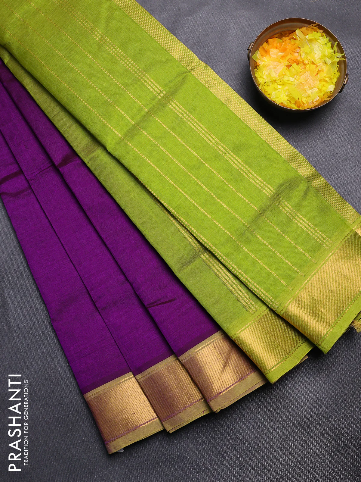 Silk cotton saree violet and light green with plain body and zari woven border