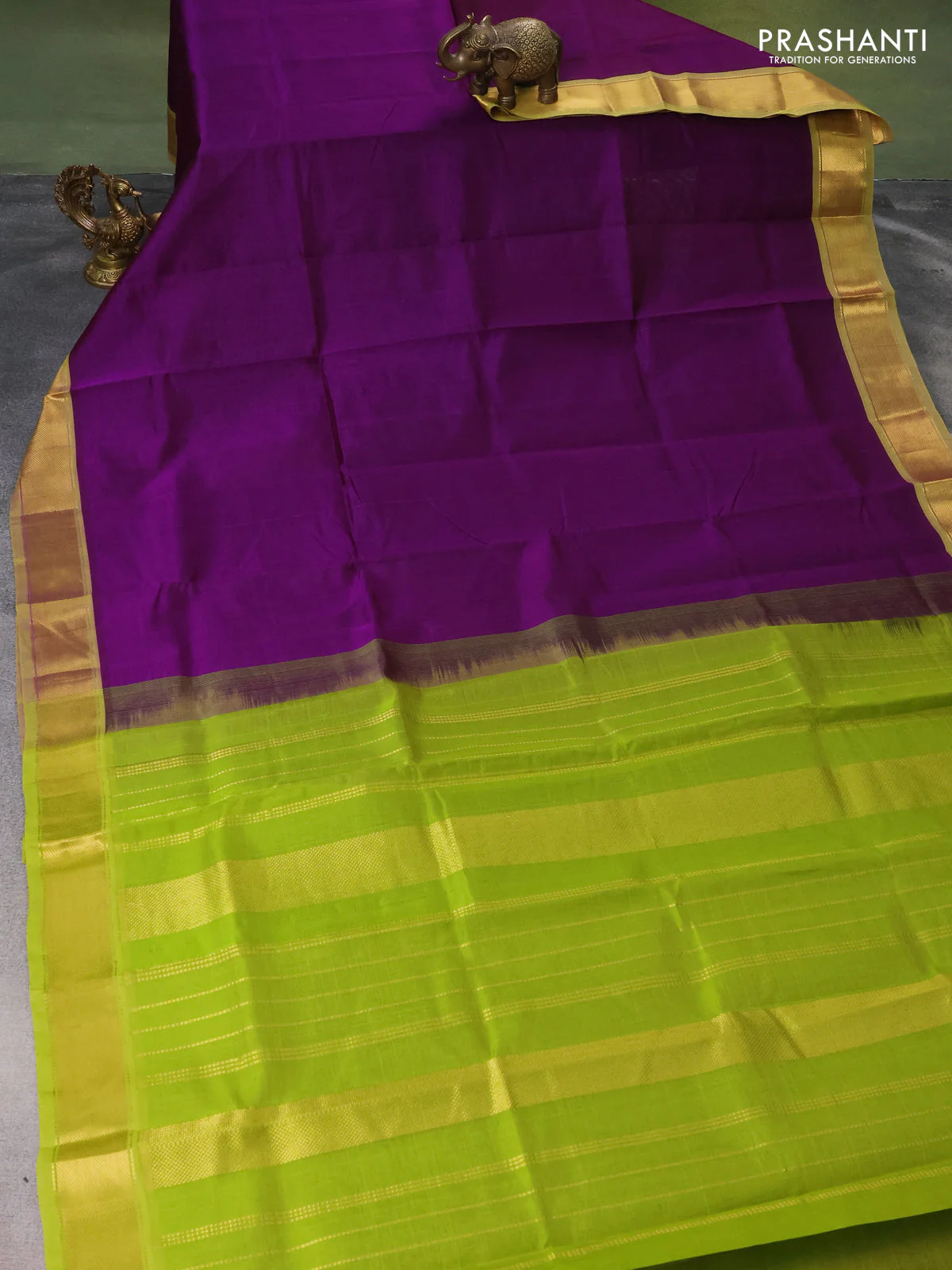 Silk cotton saree violet and light green with plain body and zari woven border - Image 2