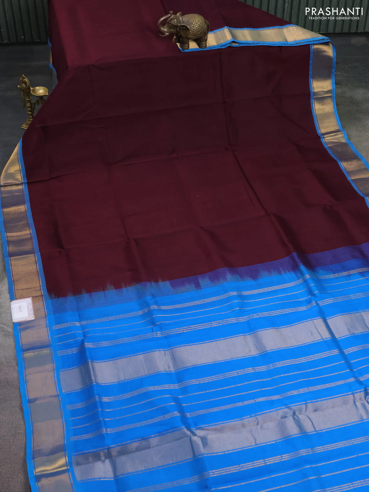 Silk cotton saree wine shade and cs blue with plain body and zari woven border - Image 2