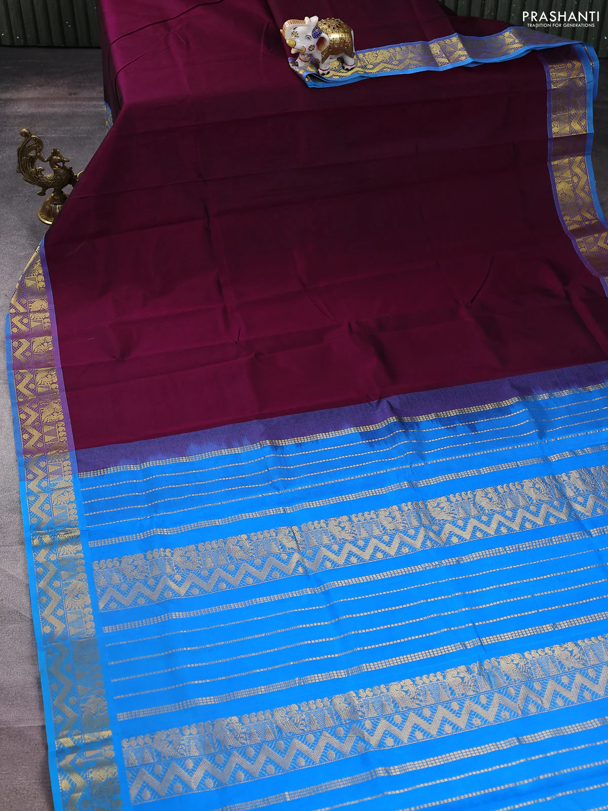 Silk cotton saree wine shade and cs blue with plain body and zari woven border - Image 2