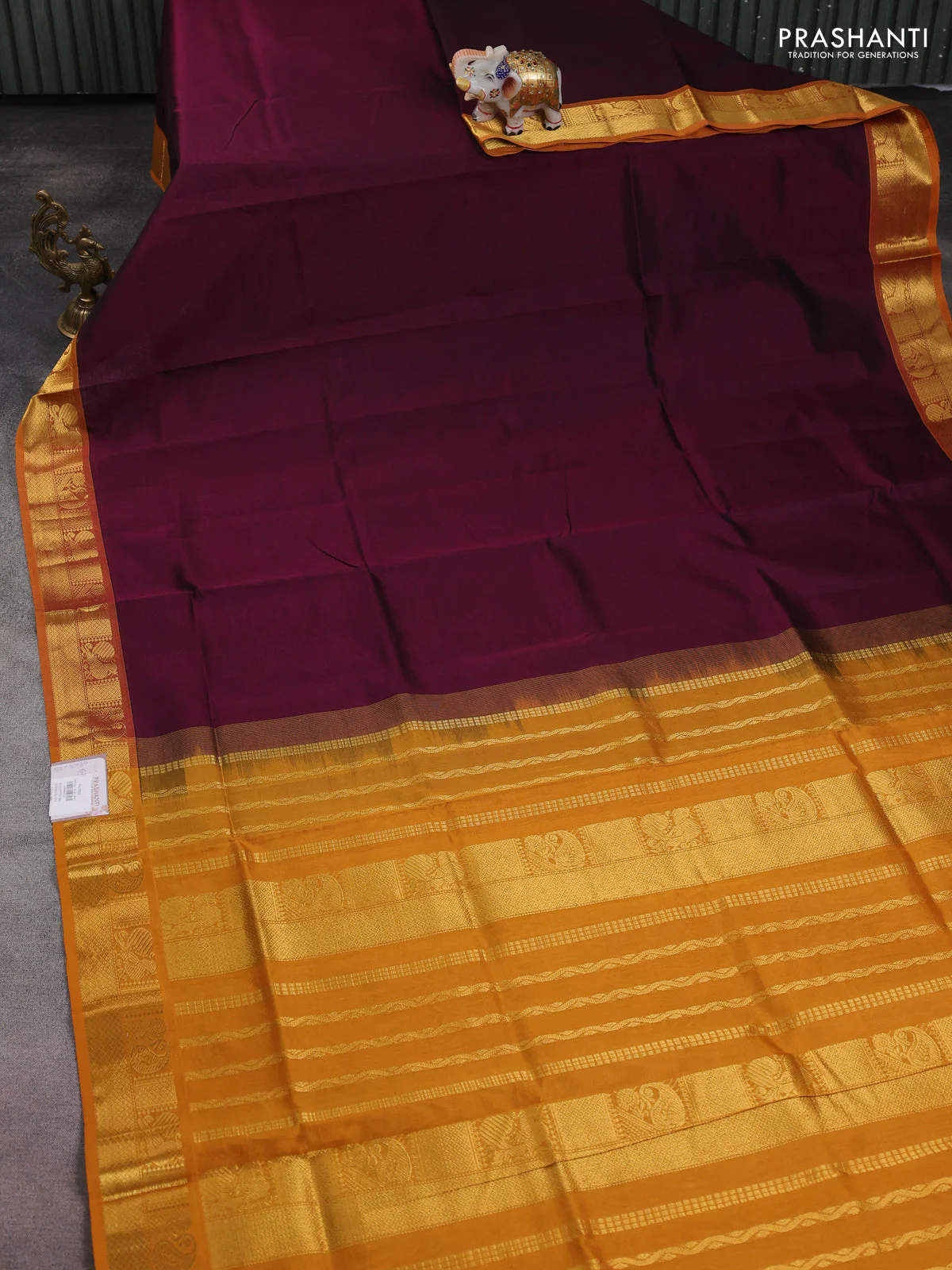 Silk cotton saree wine shade and mustard yellow with plain body and zari woven border - Image 2