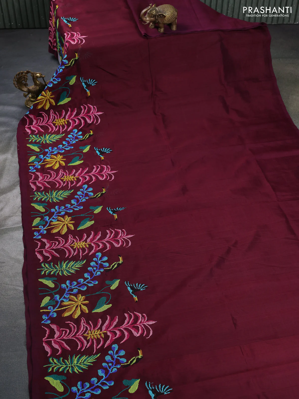 Silk cotton saree wine shade with plain body and long kutchi embroidery border - Image 2