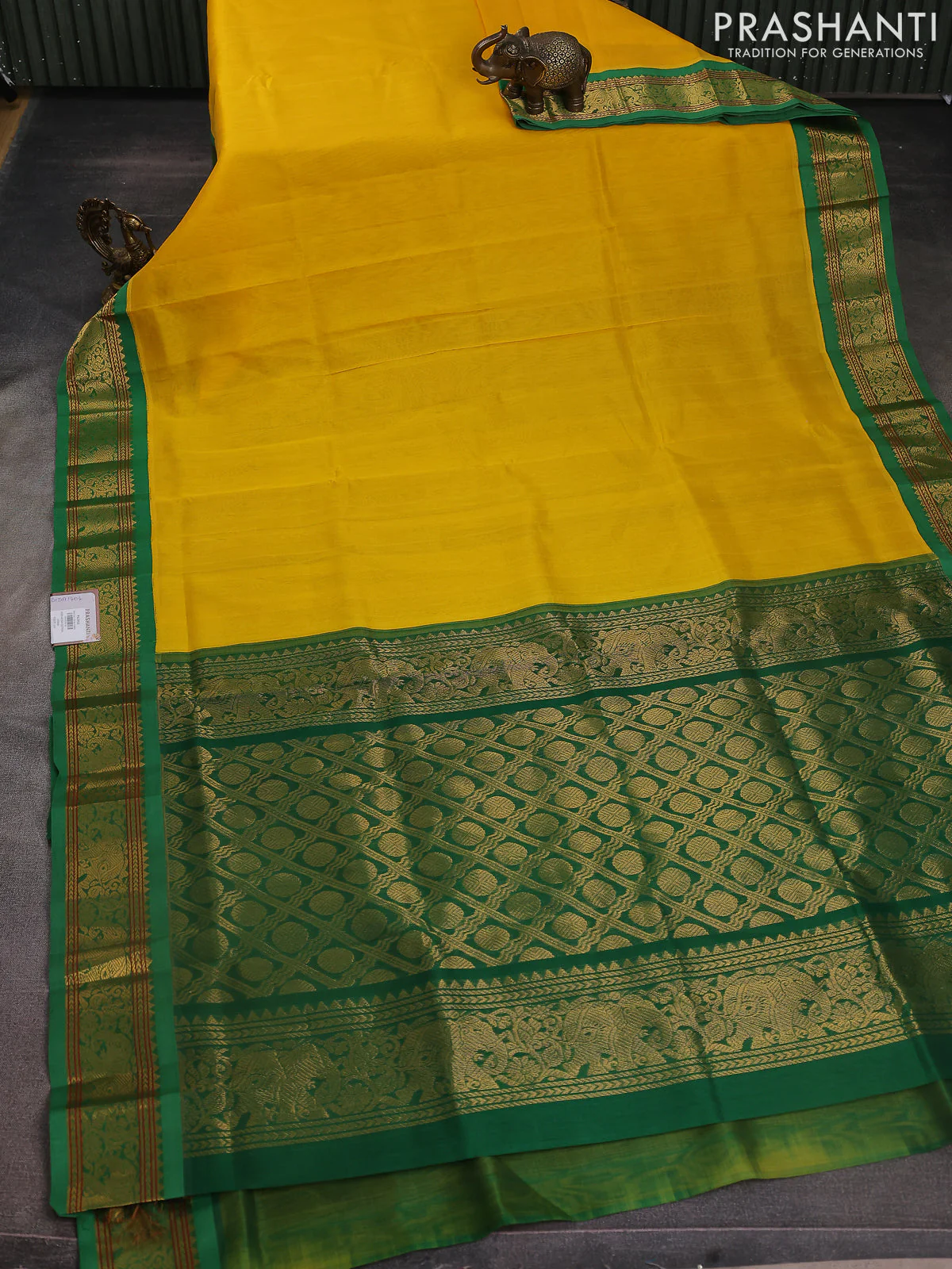Silk cotton saree yellow and green with plain body and elephant zari woven korvai border - Image 2