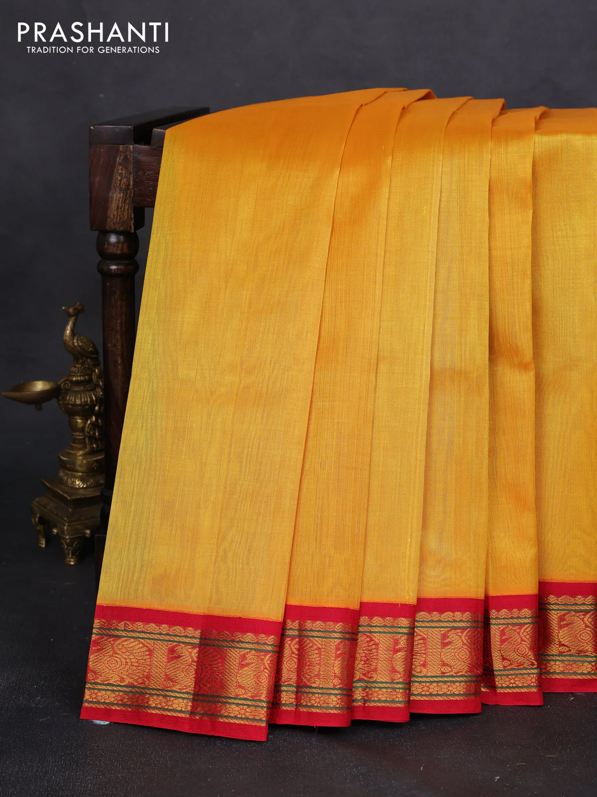 Silk cotton saree yellow and red with plain body and zari woven border