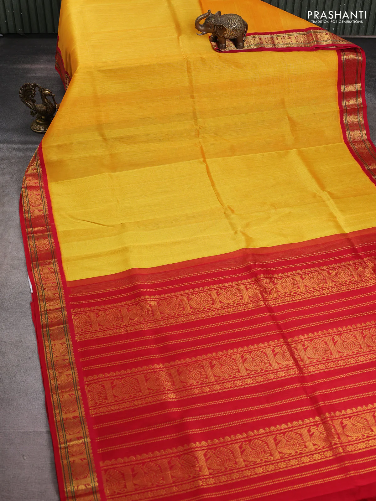 Silk cotton saree yellow and red with plain body and zari woven border - Image 2