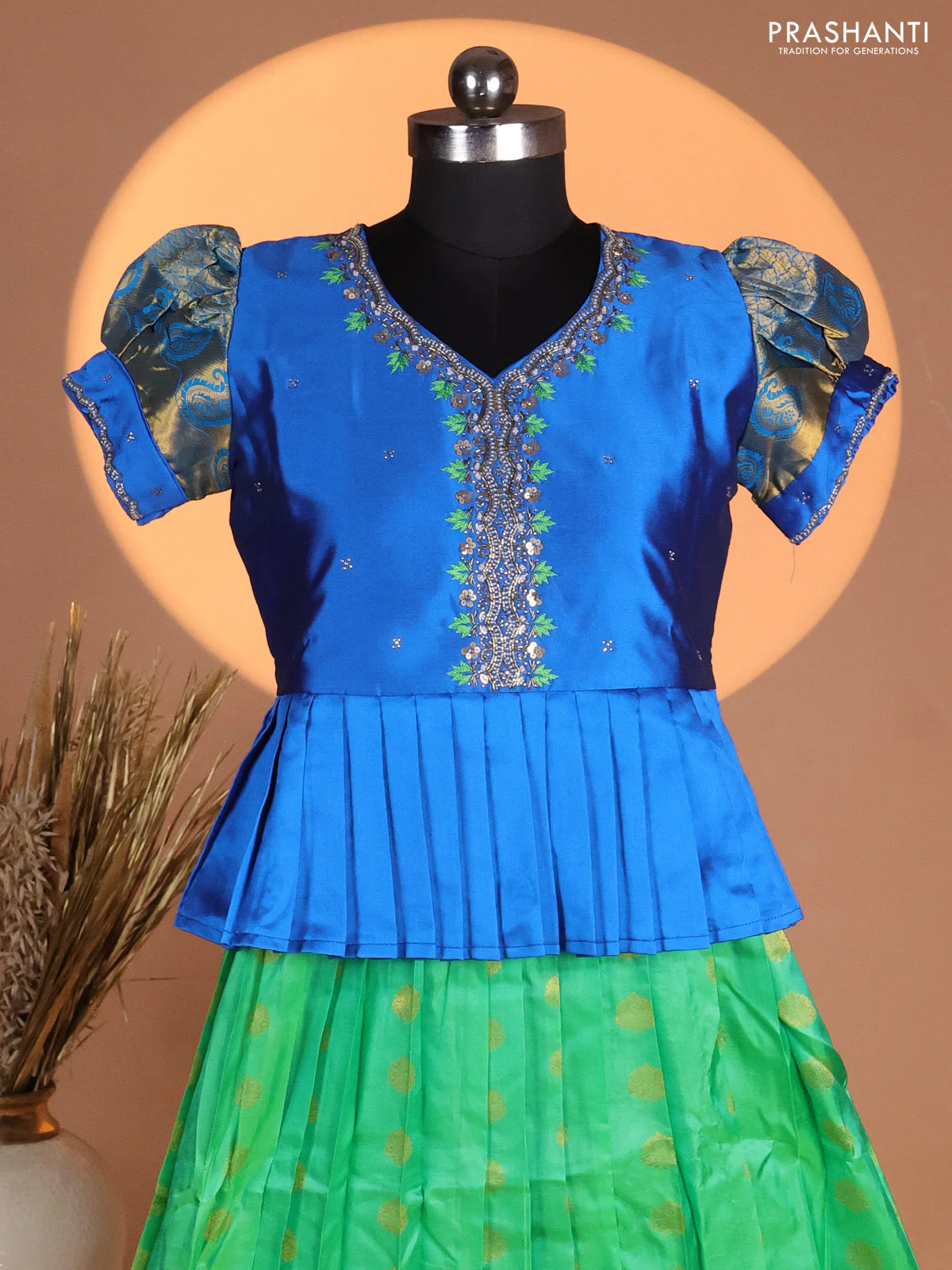 Silk kids lehenga blue and green with aari work neck pattern & puff sleeve and zari buttas & zari woven border - Image 2