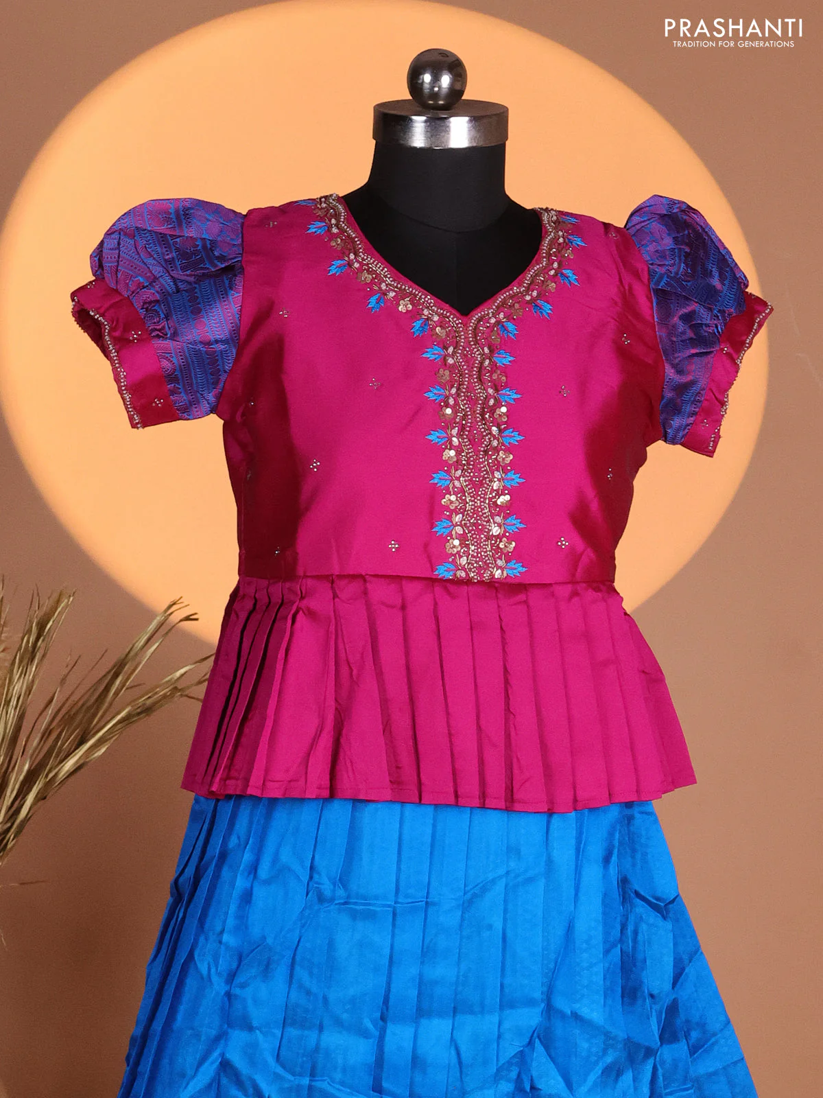 Silk kids lehenga magenta pink and cs blue with aari work neck pattern & puff sleeve and allover self emboss & zari woven border - Image 2