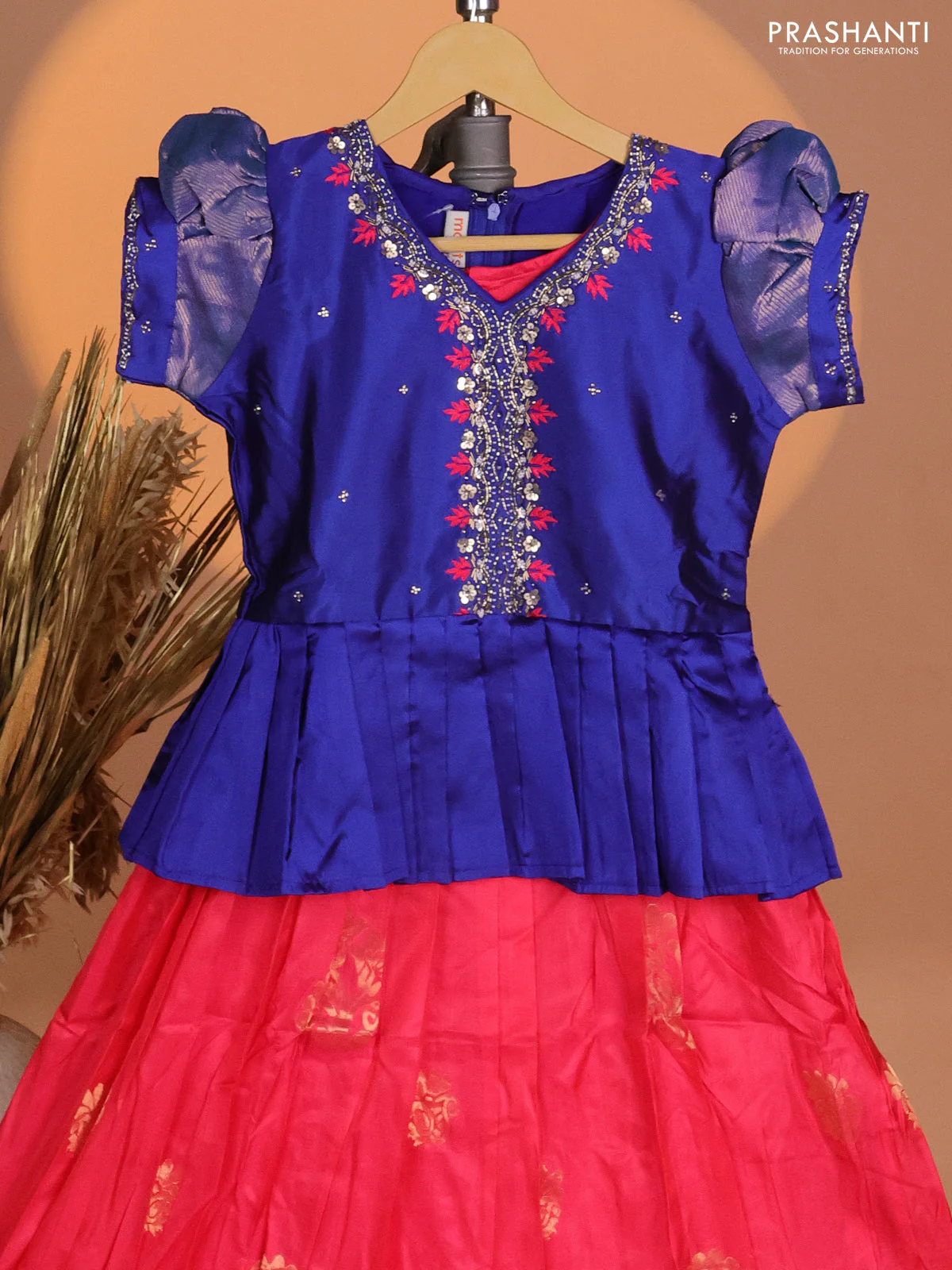 Silk kids lehenga royal blue and peach pink with aari work neck pattern & puff sleeve and zari buttas & zari woven border - Image 2