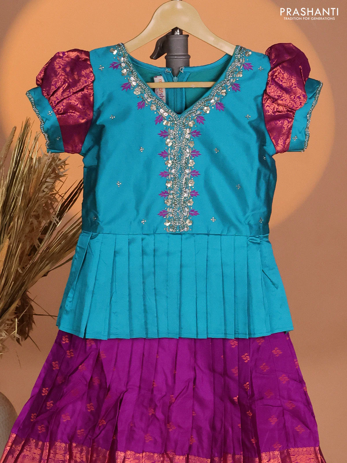 Silk kids lehenga teal blue and purple with aari work neck pattern & puff sleeve and copper zari buttas & zari woven border - Image 2
