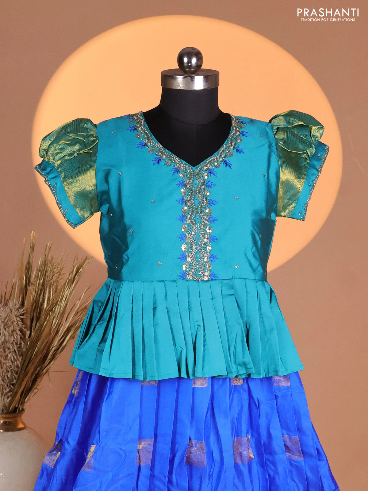 Silk kids lehenga teal blue shade and blue with aari work neck pattern & puff sleeve and zari buttas & zari woven border - Image 2