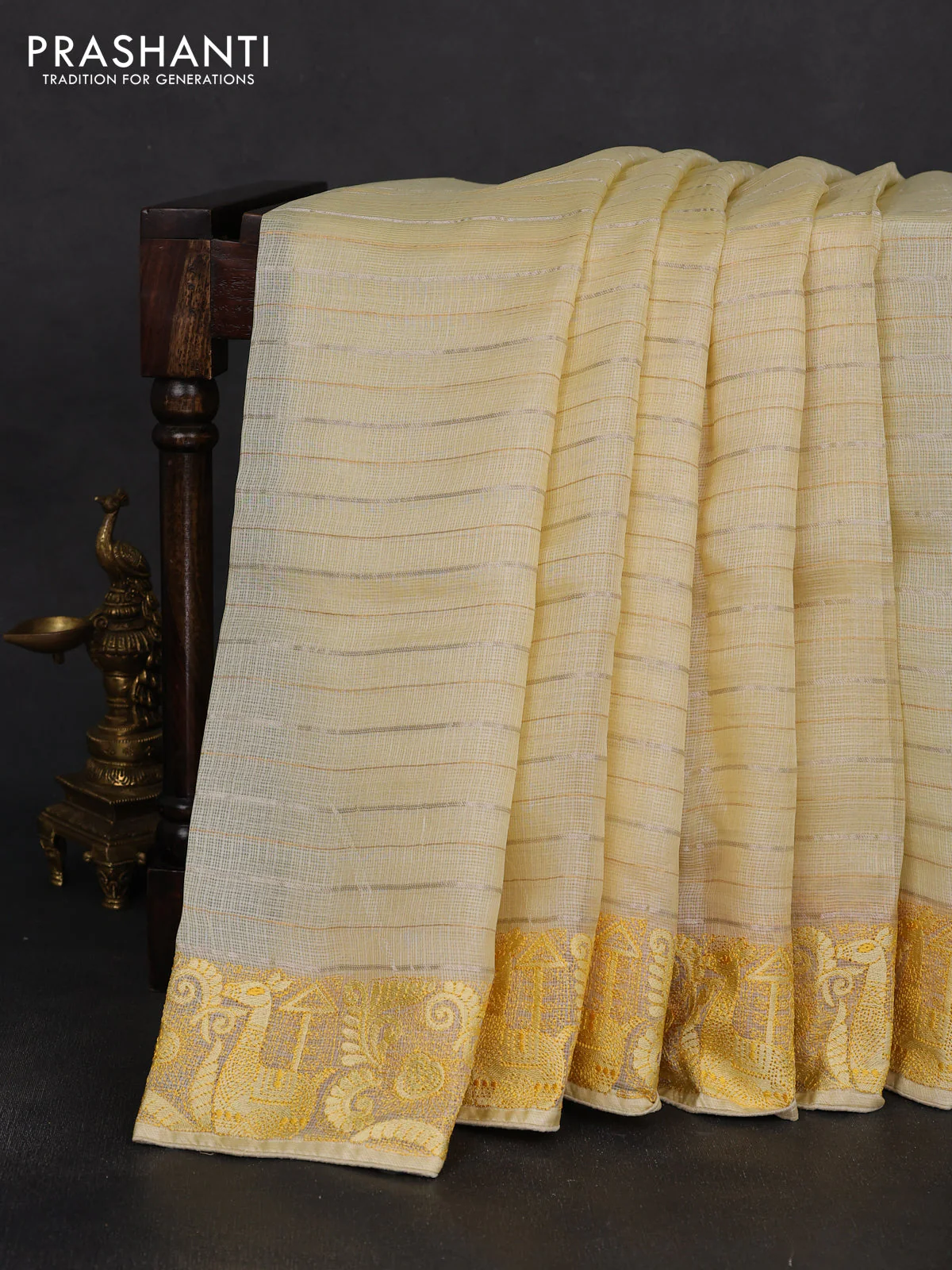 Silk kota saree pale yellow with allover silver & gold zari stripe pattern and embroidery border