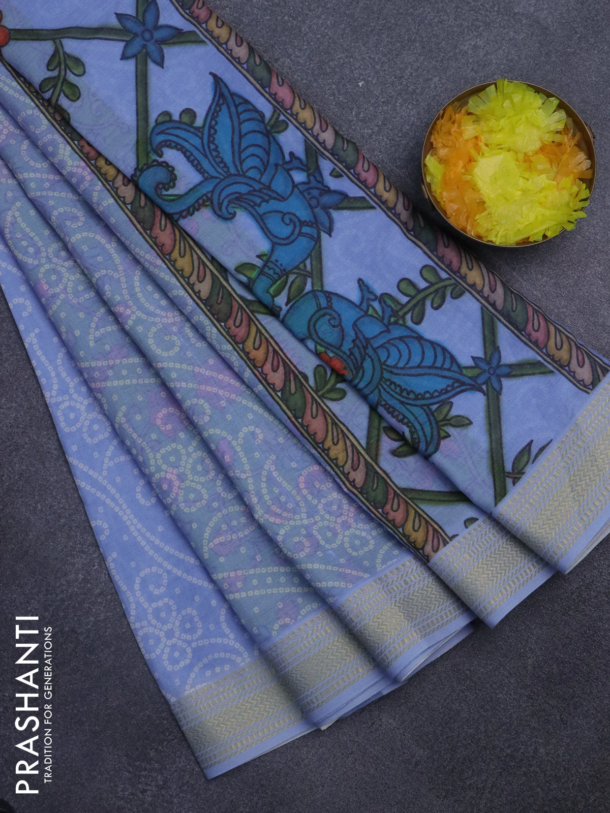 Spun cotton saree blue shade with allover bandhani prints and zari woven border