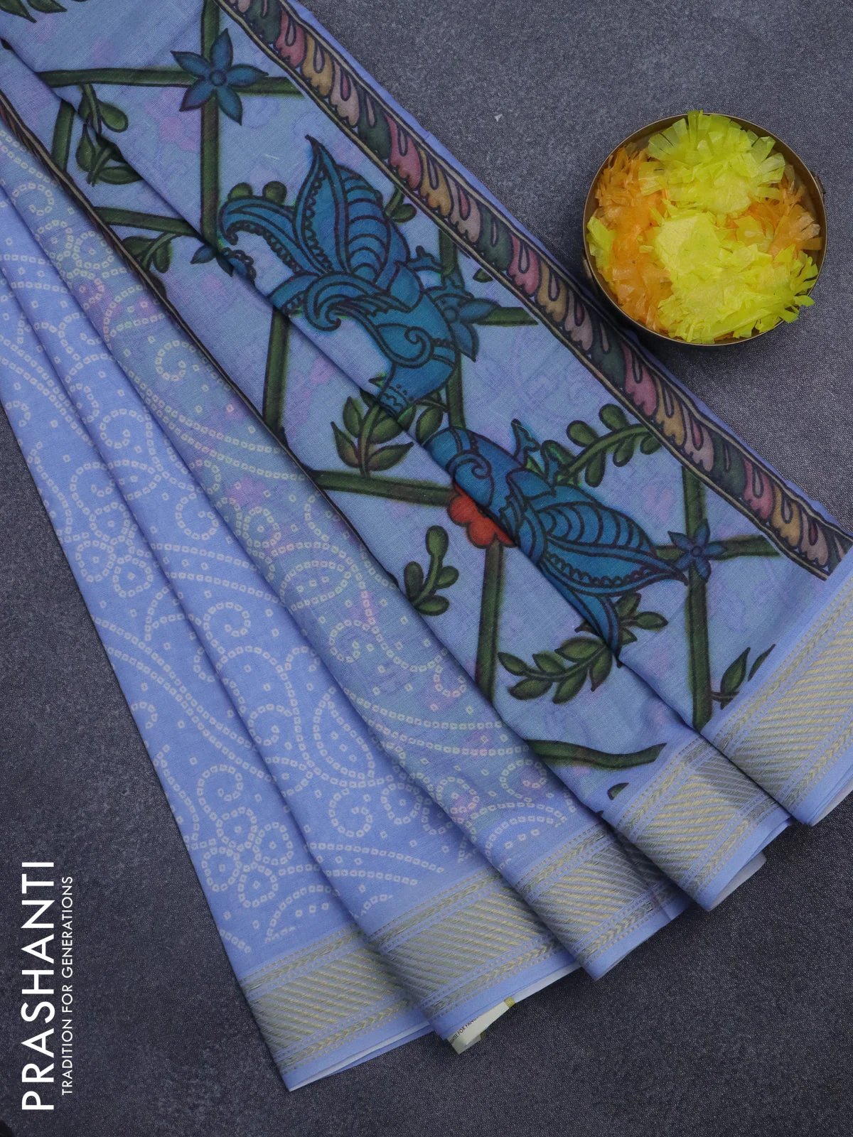 Spun cotton saree blue shade with allover bandhani prints and zari woven border