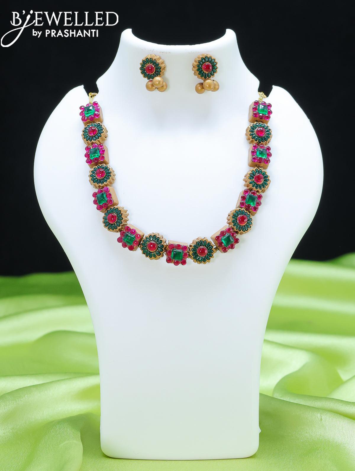 Teracotta necklace floral design with kemp stone