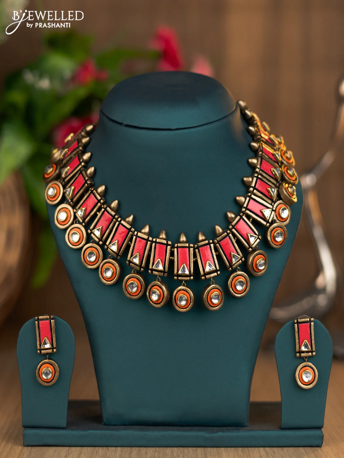 Terracotta pink and orange necklace with hangings