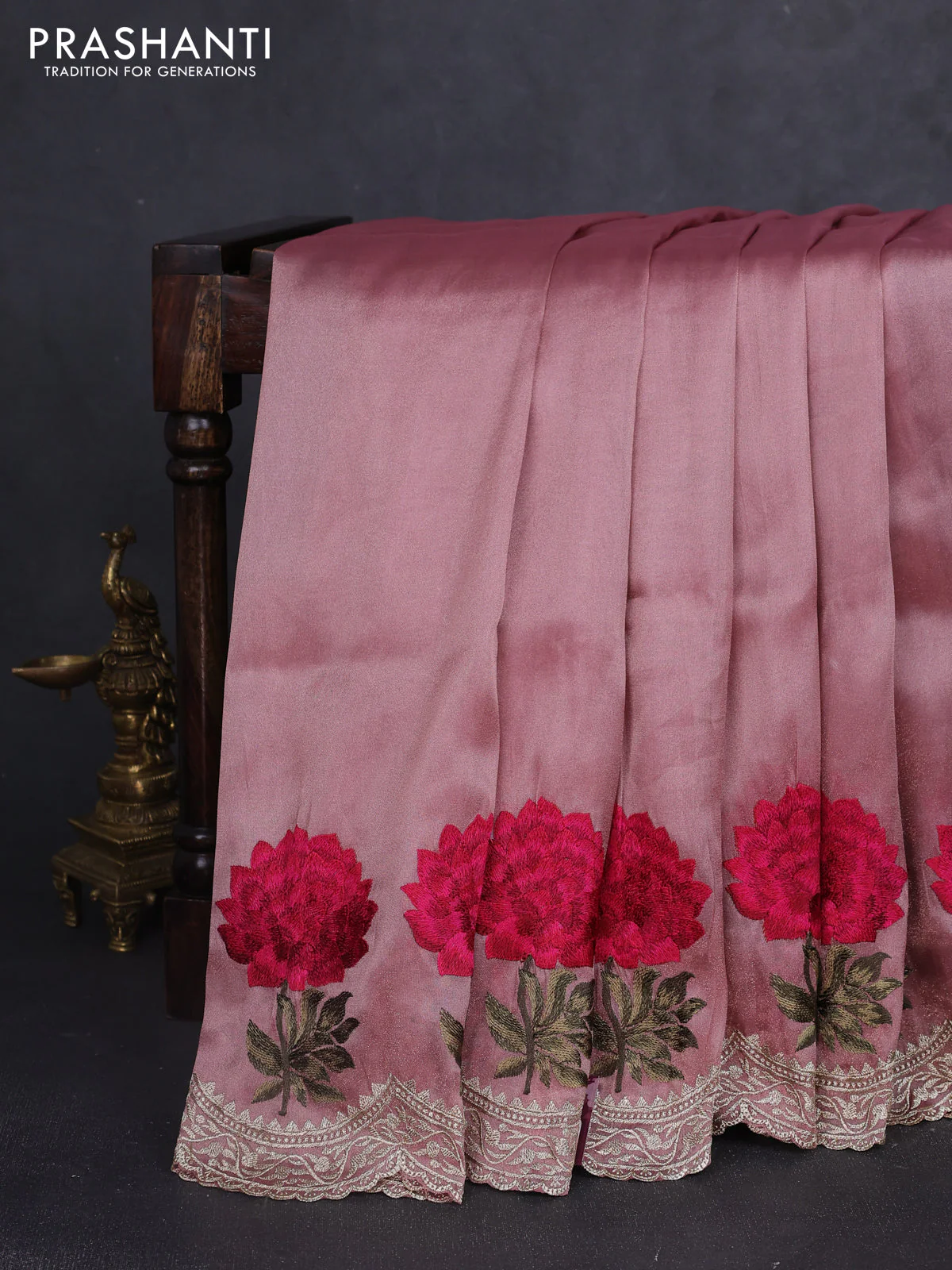 Tissue organza saree pastel peach with plain body and floral embroidery border