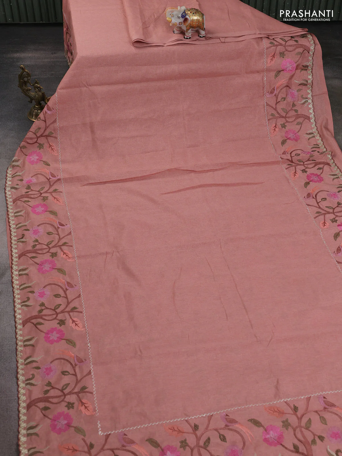 Tissue organza saree peach shade with plain body and embroidery border - Image 2